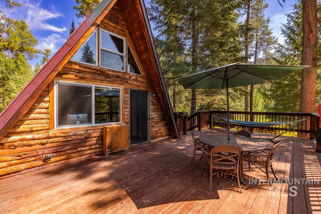 Wooden terrace with outdoor dining area