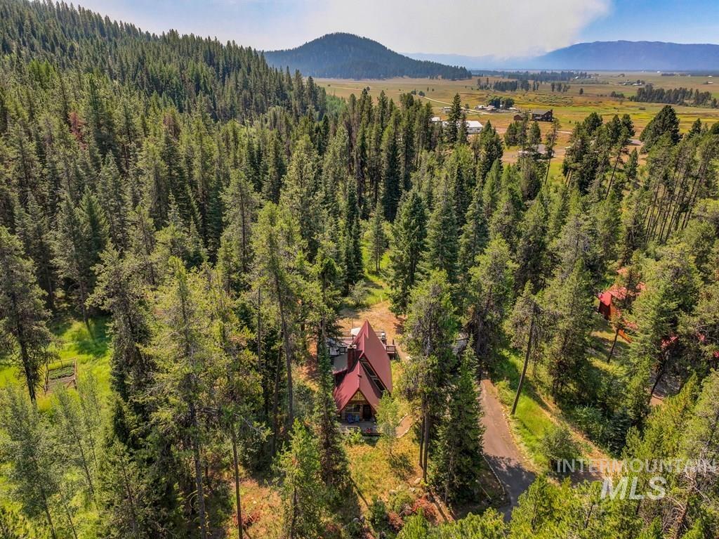 View of subject property with mountains