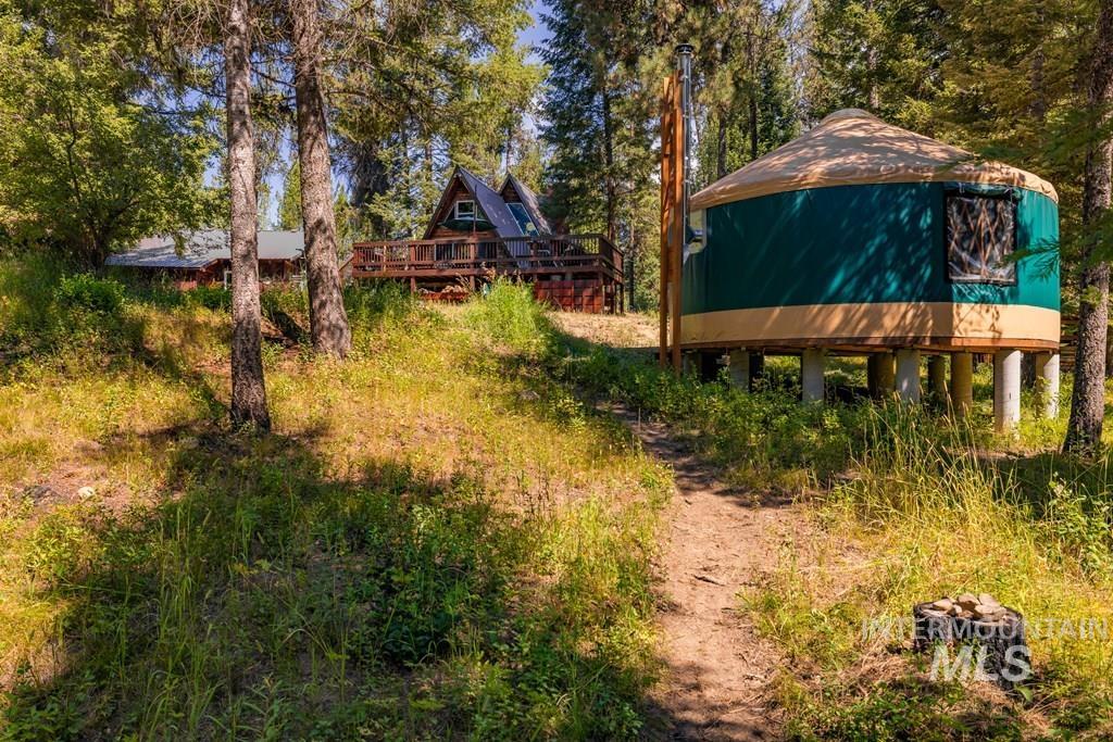 View of yard featuring a deck