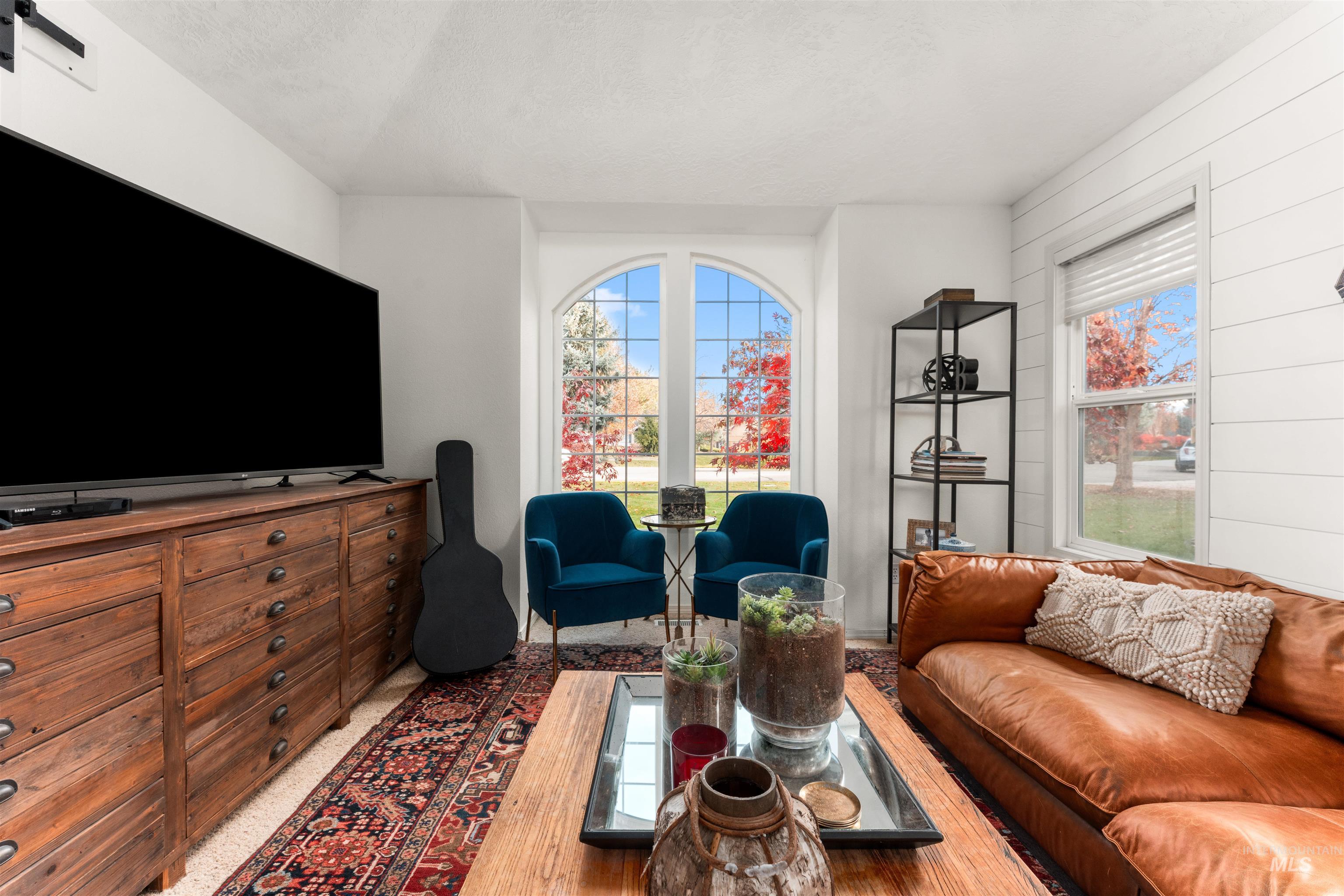 Living area featuring a textured ceiling