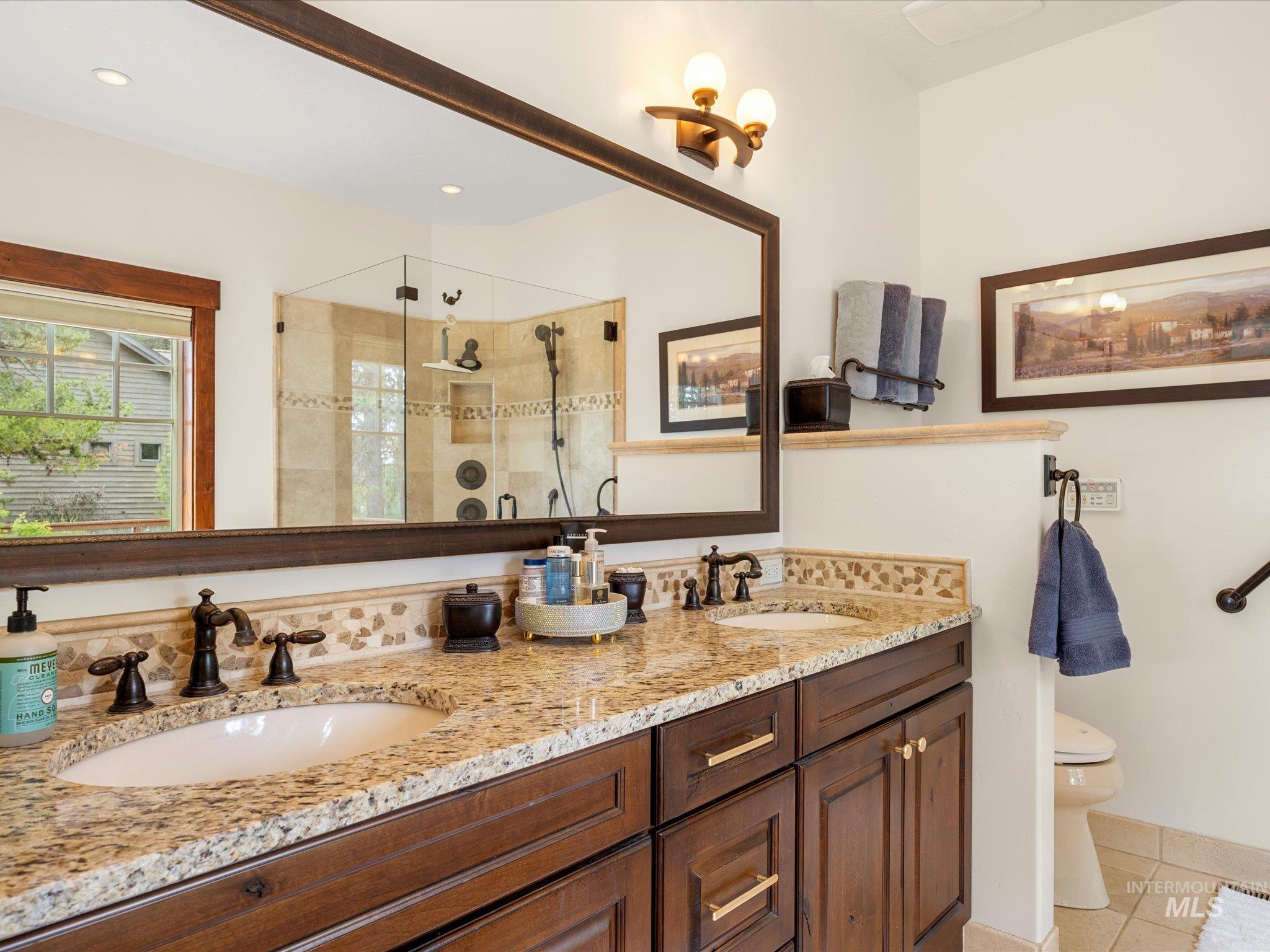 Primary bathroom with Dual Vanity, garden tub and shower