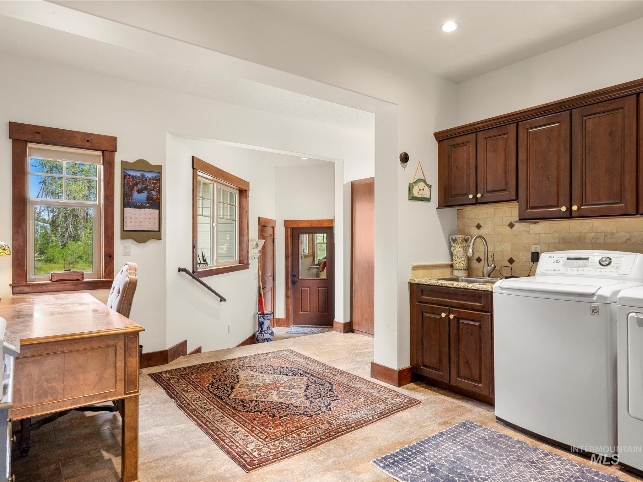 Newly added sq footage - Creating a Large Mudroom with custom built-ins for storage.