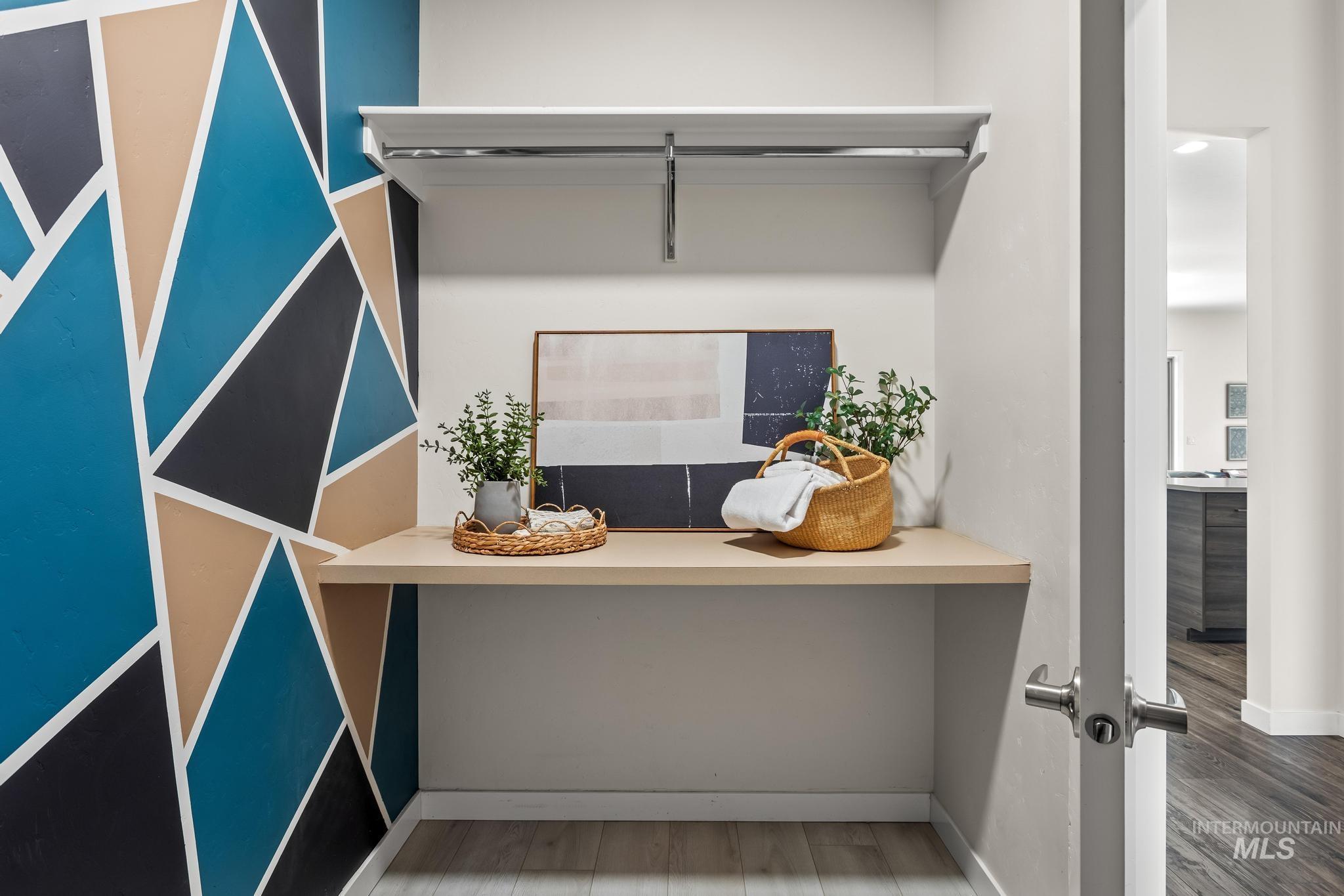 Detailed view of wood finished floors and baseboards