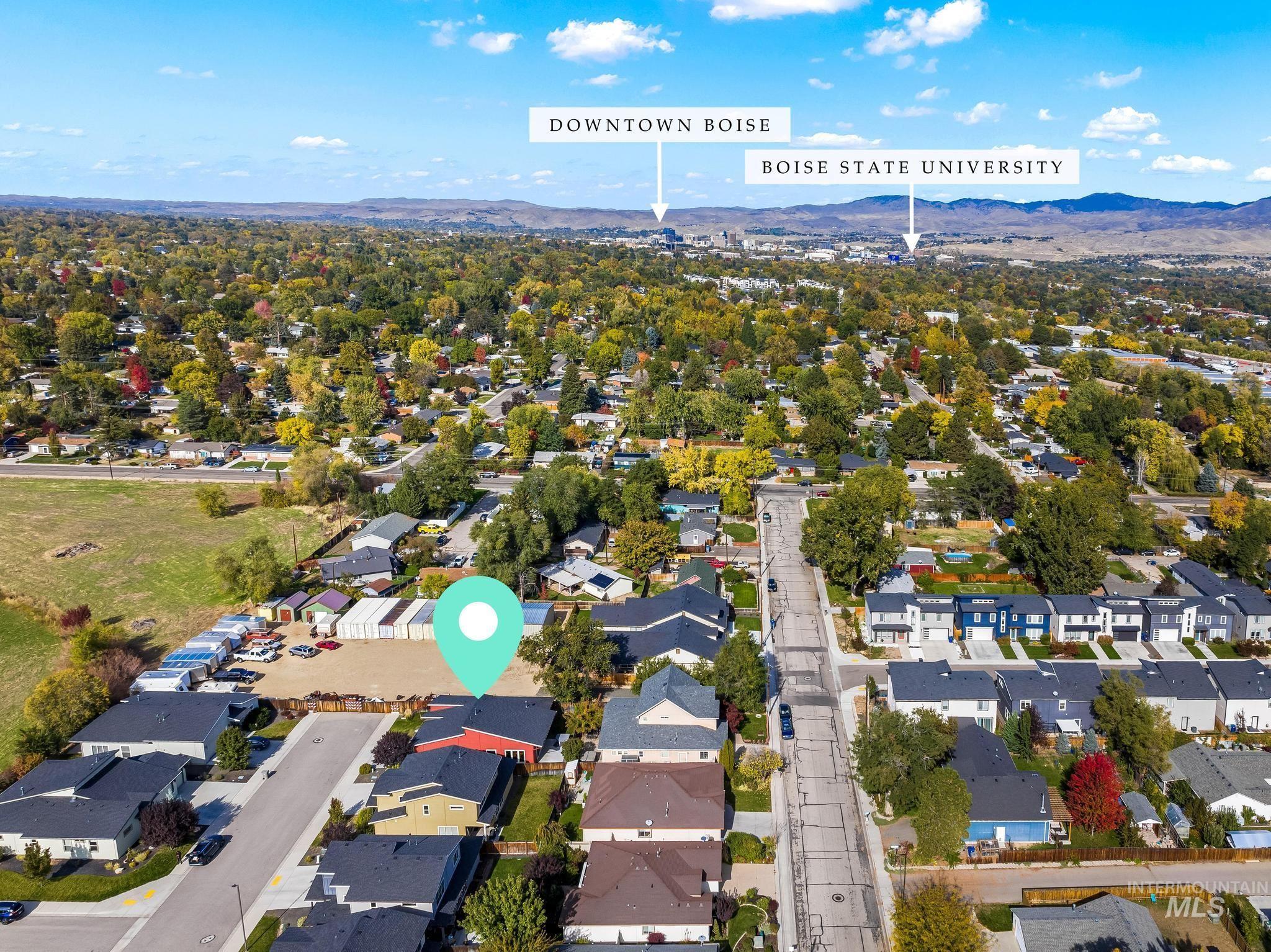 Aerial perspective of suburban area with mountains