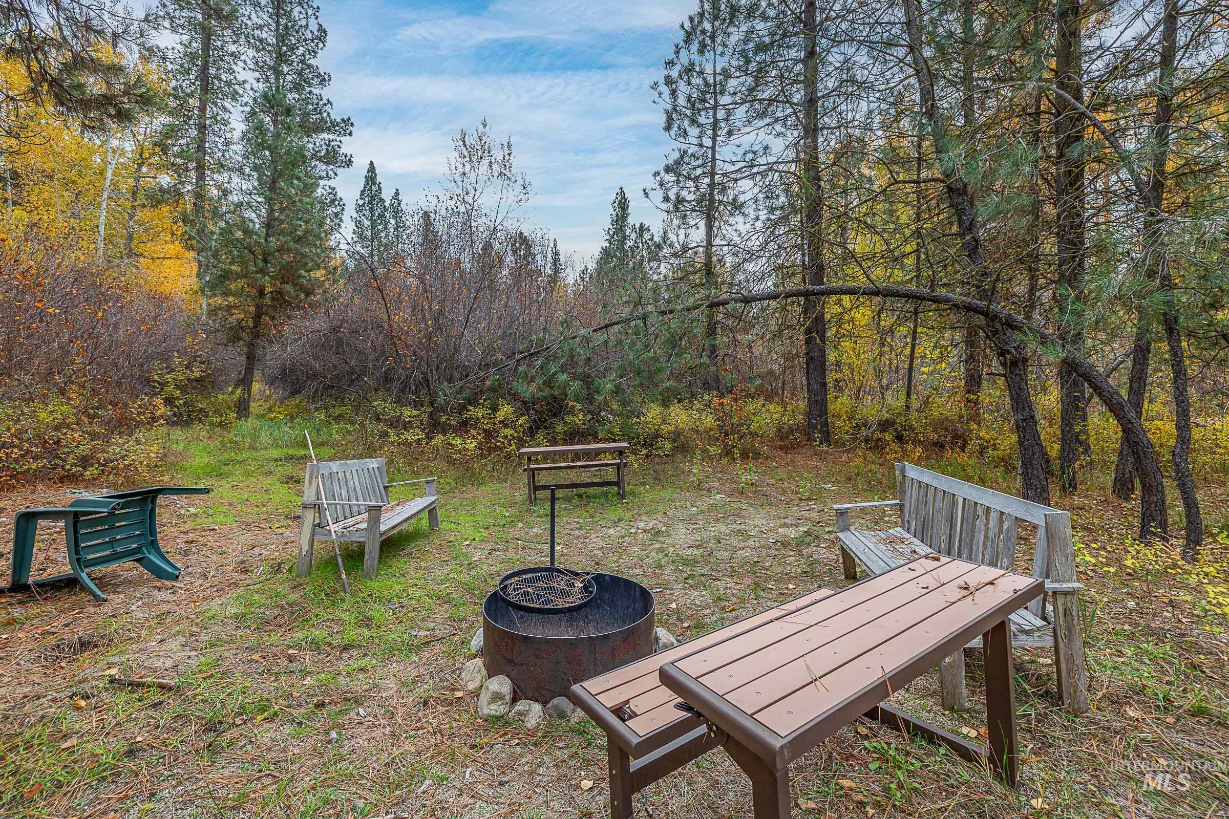 View of yard featuring a fire pit