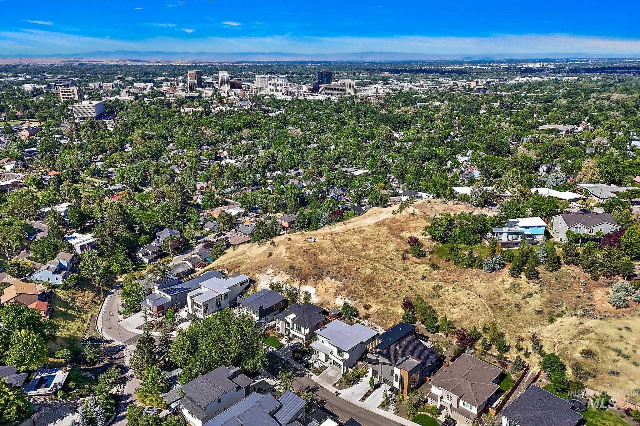 Aerial perspective showcasing a residential hillside development
