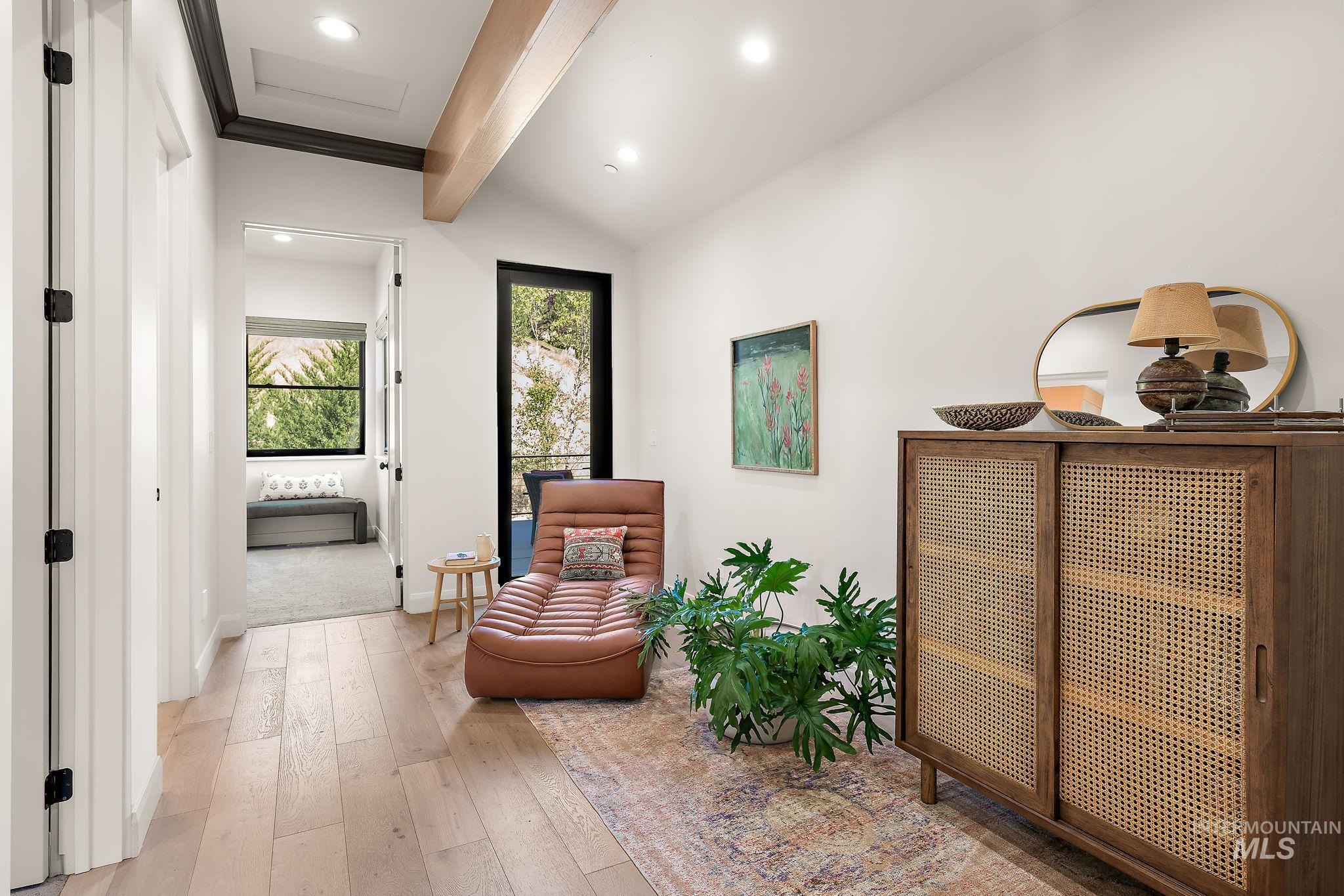 Vaulted ceiling with exposed wood beam