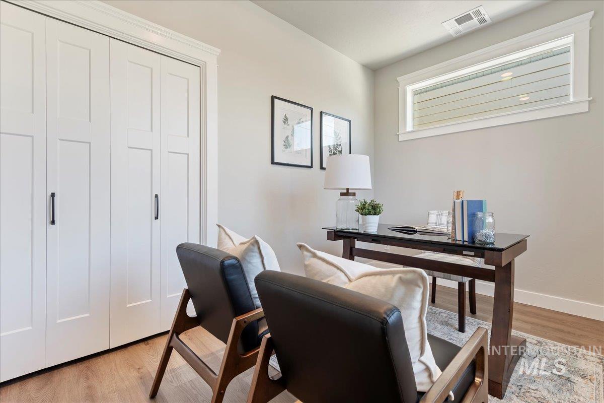 Office featuring light wood finished floors and baseboards