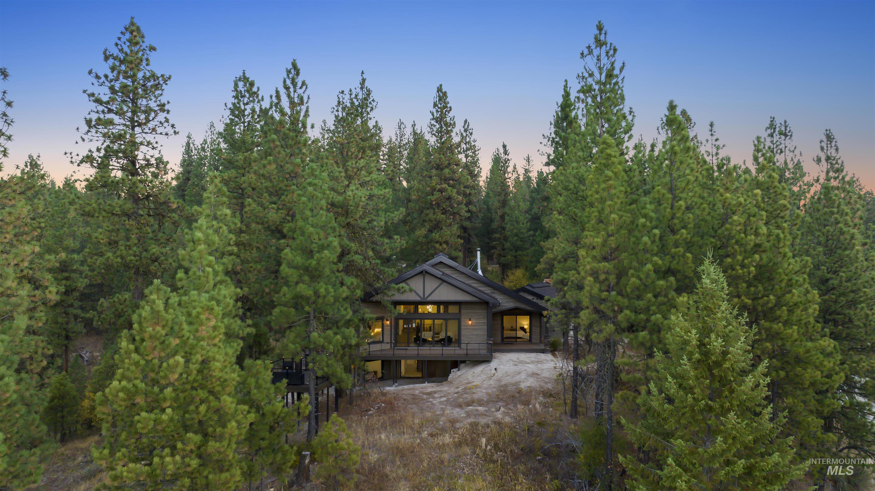 Rear view of house with a wooden deck