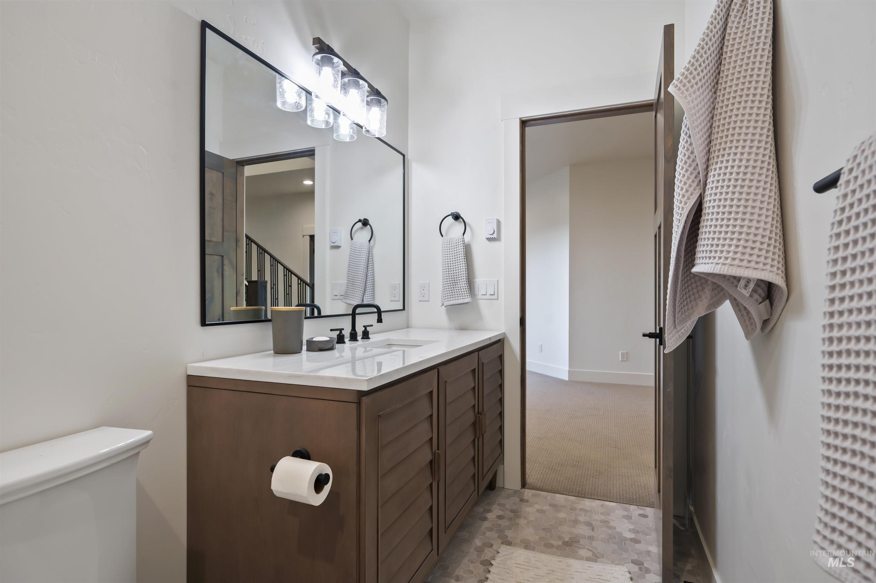 Bathroom with vanity and toilet