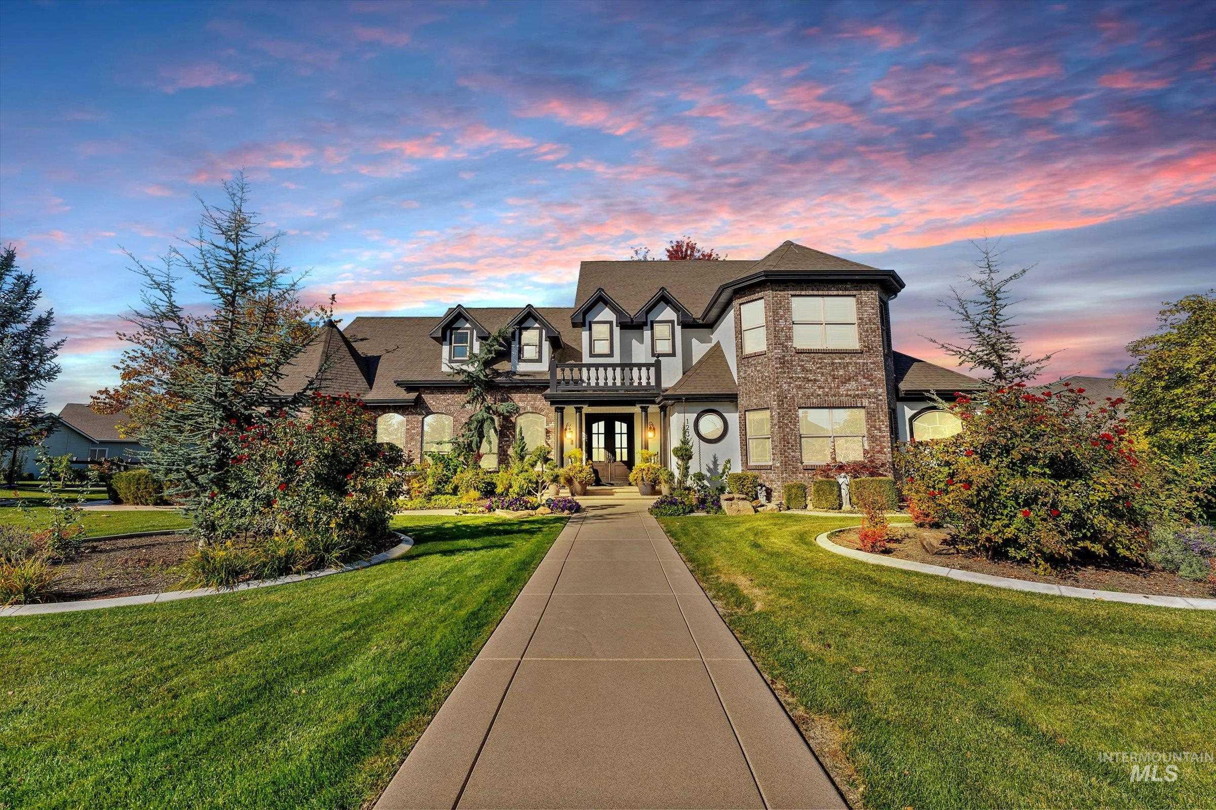 Tudor home with a front lawn