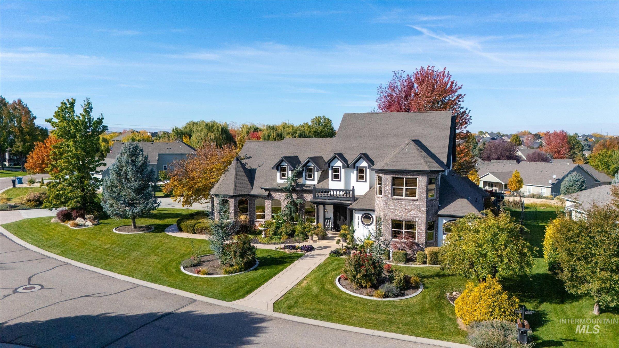 View of front of home featuring a front yard and a residential view
