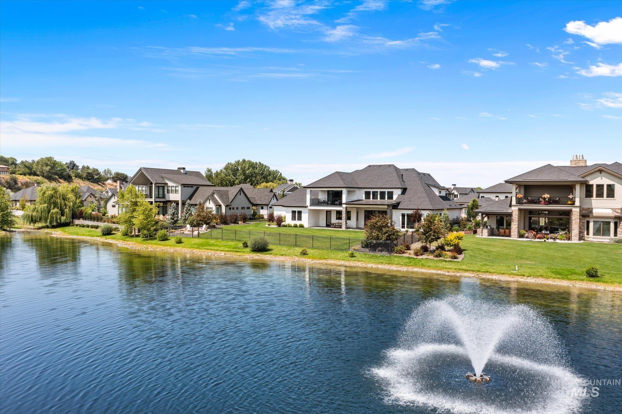 Water view with nearby suburban area