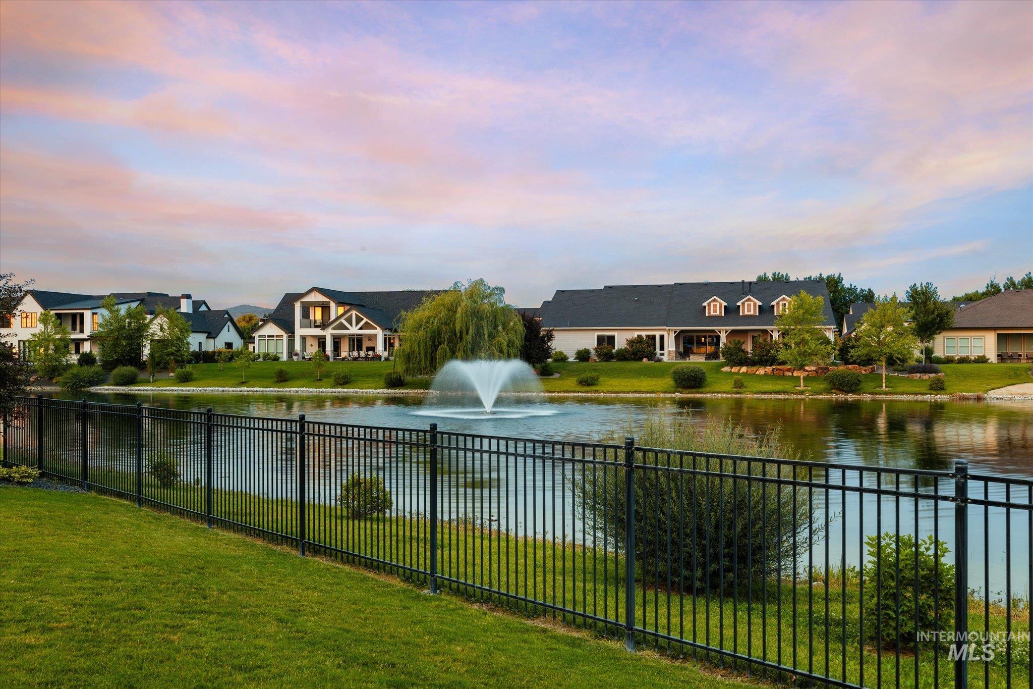 Water view featuring nearby suburban area