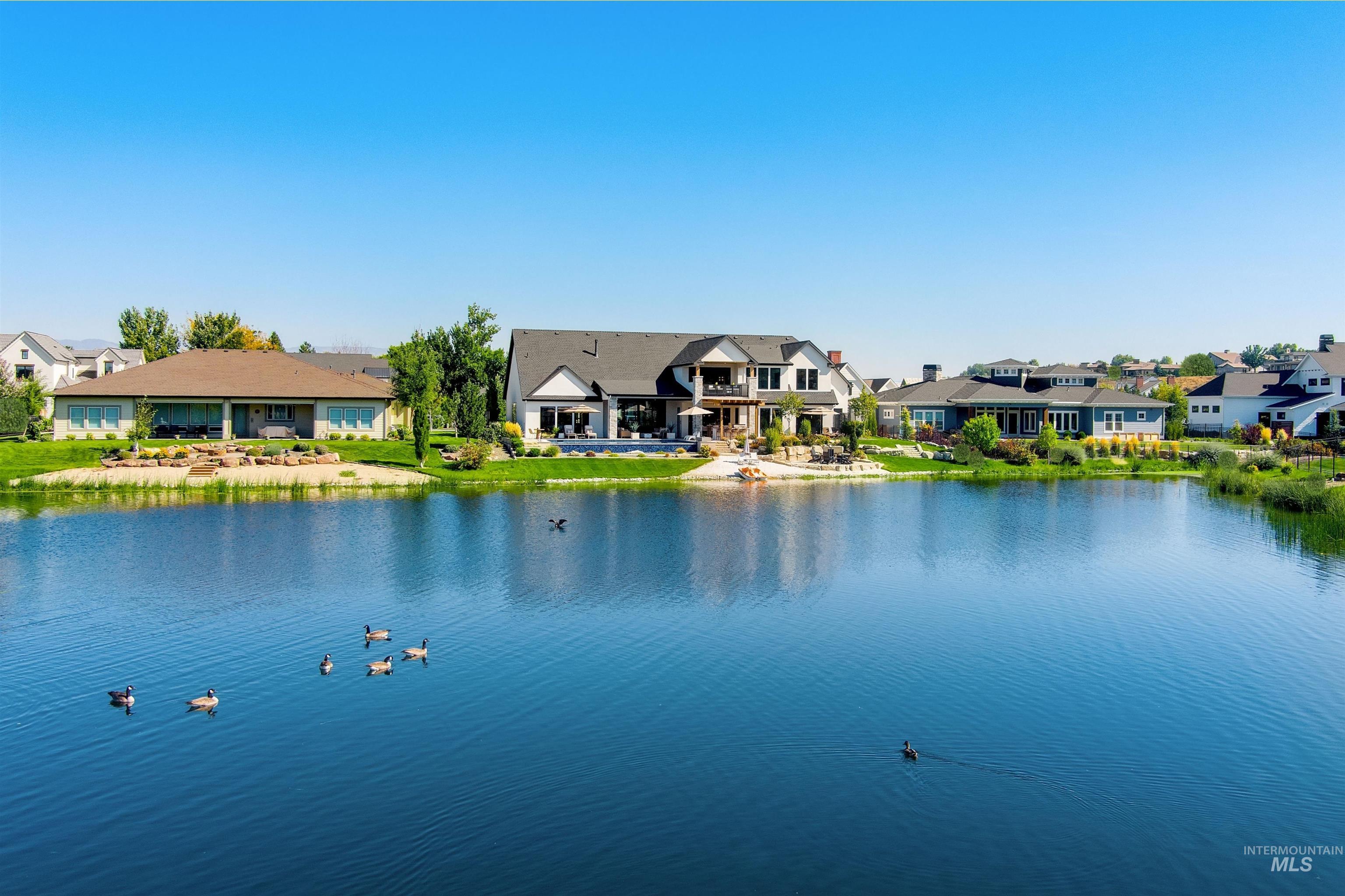 Water view with nearby suburban area