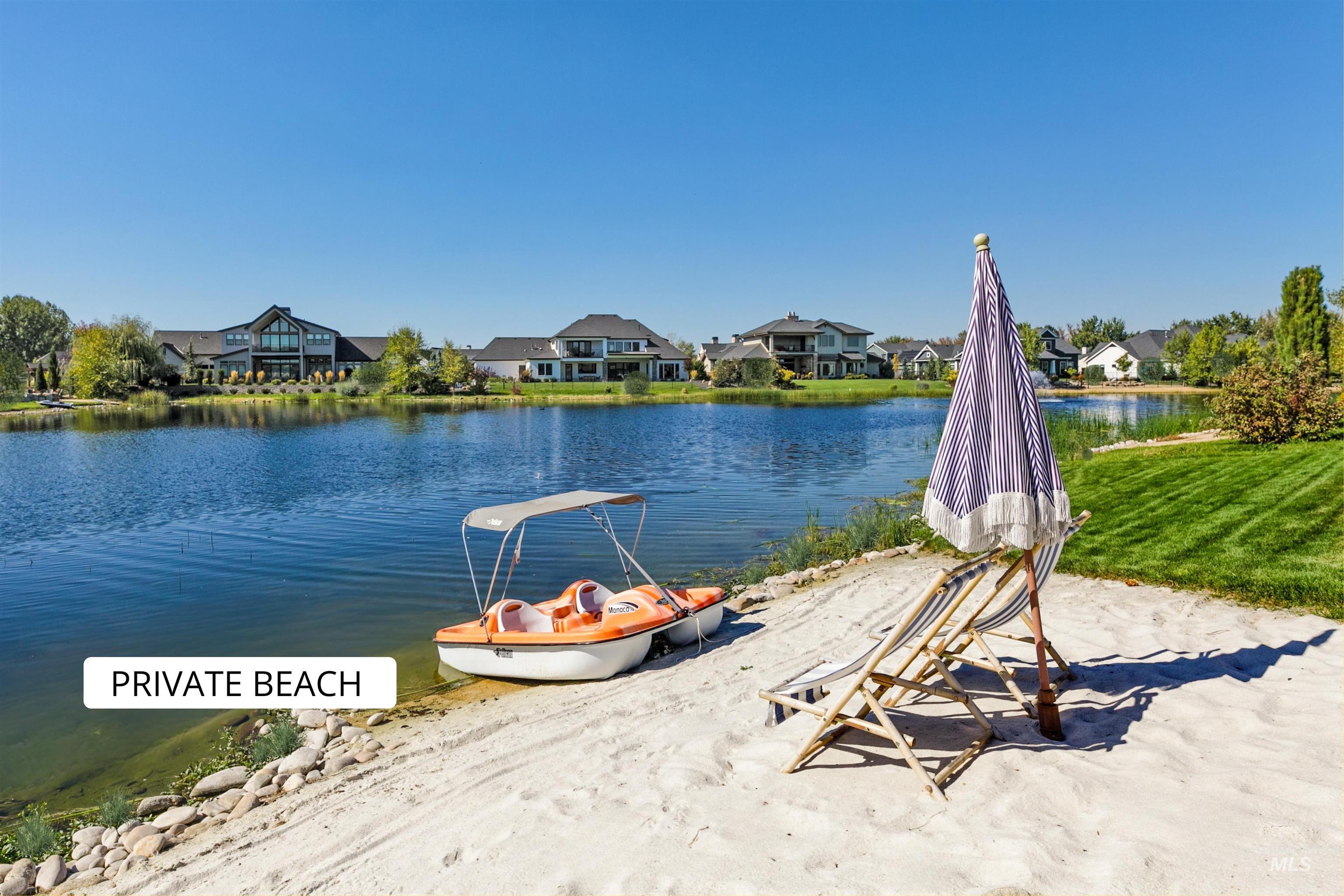 Water view featuring nearby suburban area