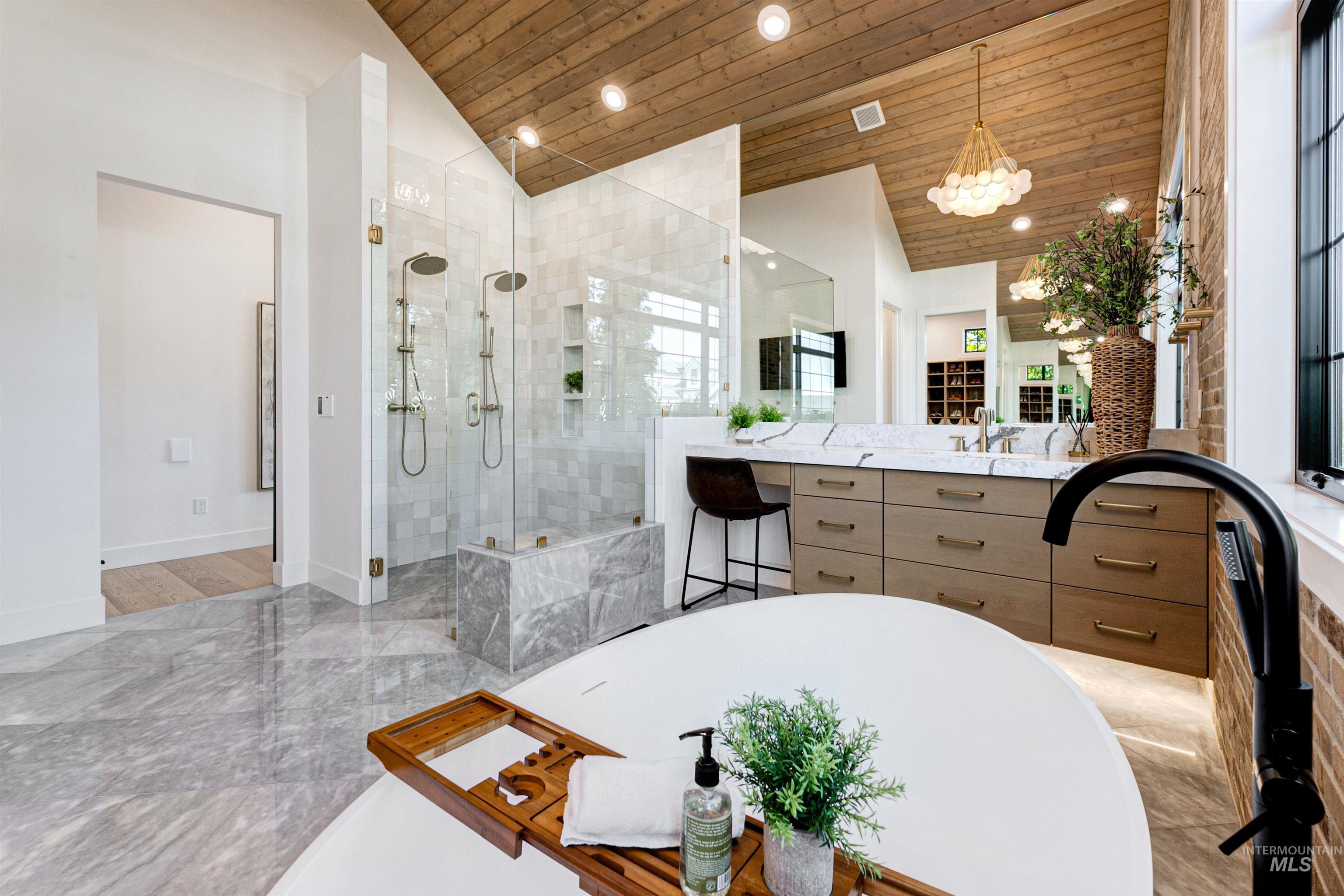 Full bathroom with vaulted ceiling, a stall shower, vanity, wooden ceiling, and recessed lighting