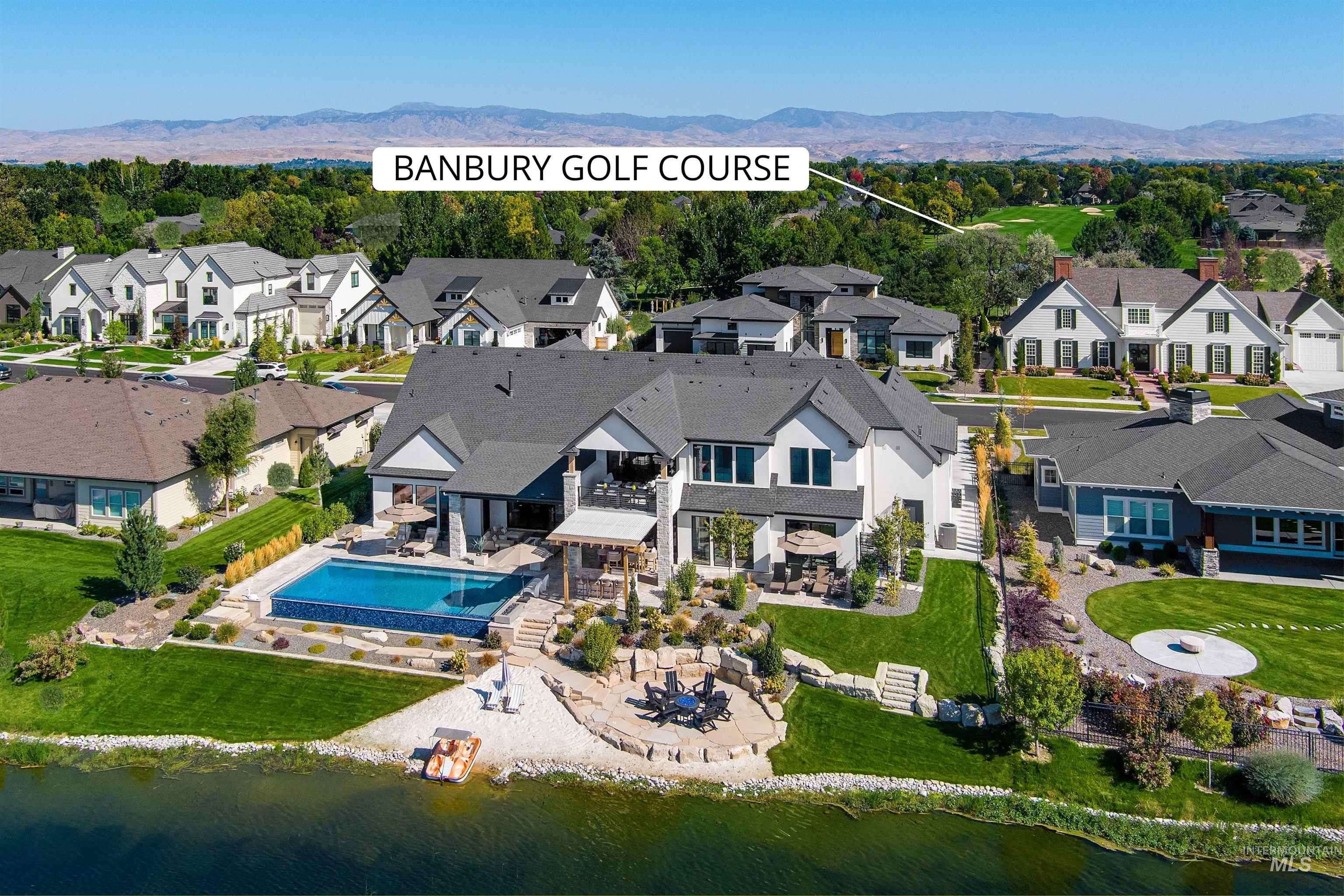 Aerial view of residential area with a mountainous background
