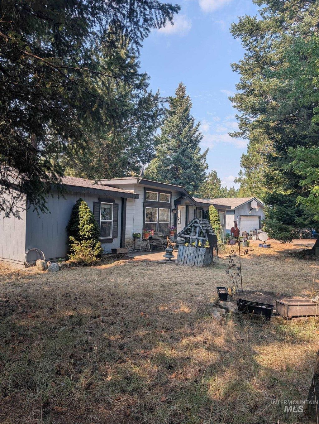 Photo of 8700 E Morning Glory Ave, Athol, ID 83801 (MLS # 98970879)