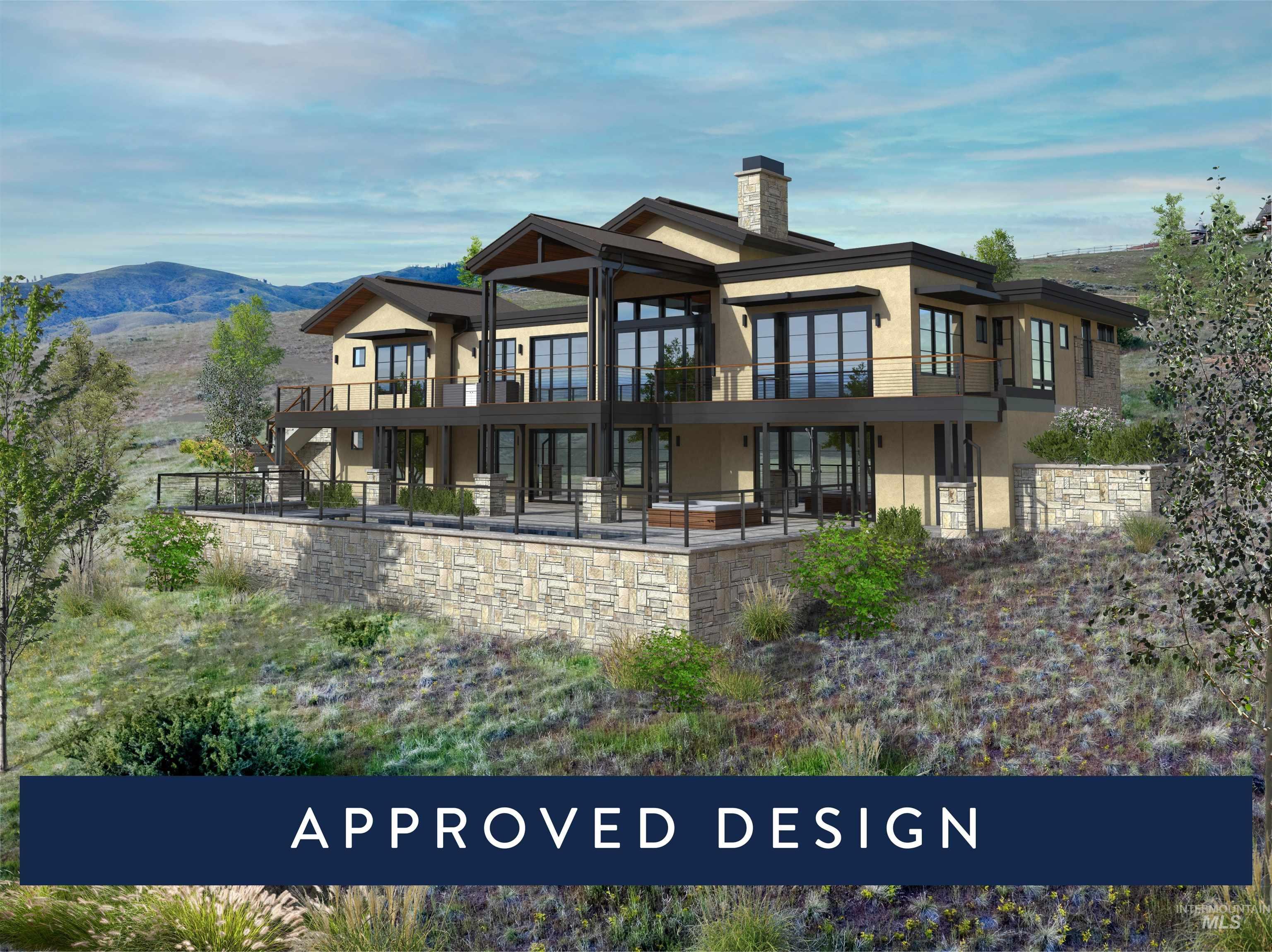 Back of property featuring stucco siding, a chimney, a patio area, and a deck with mountain view