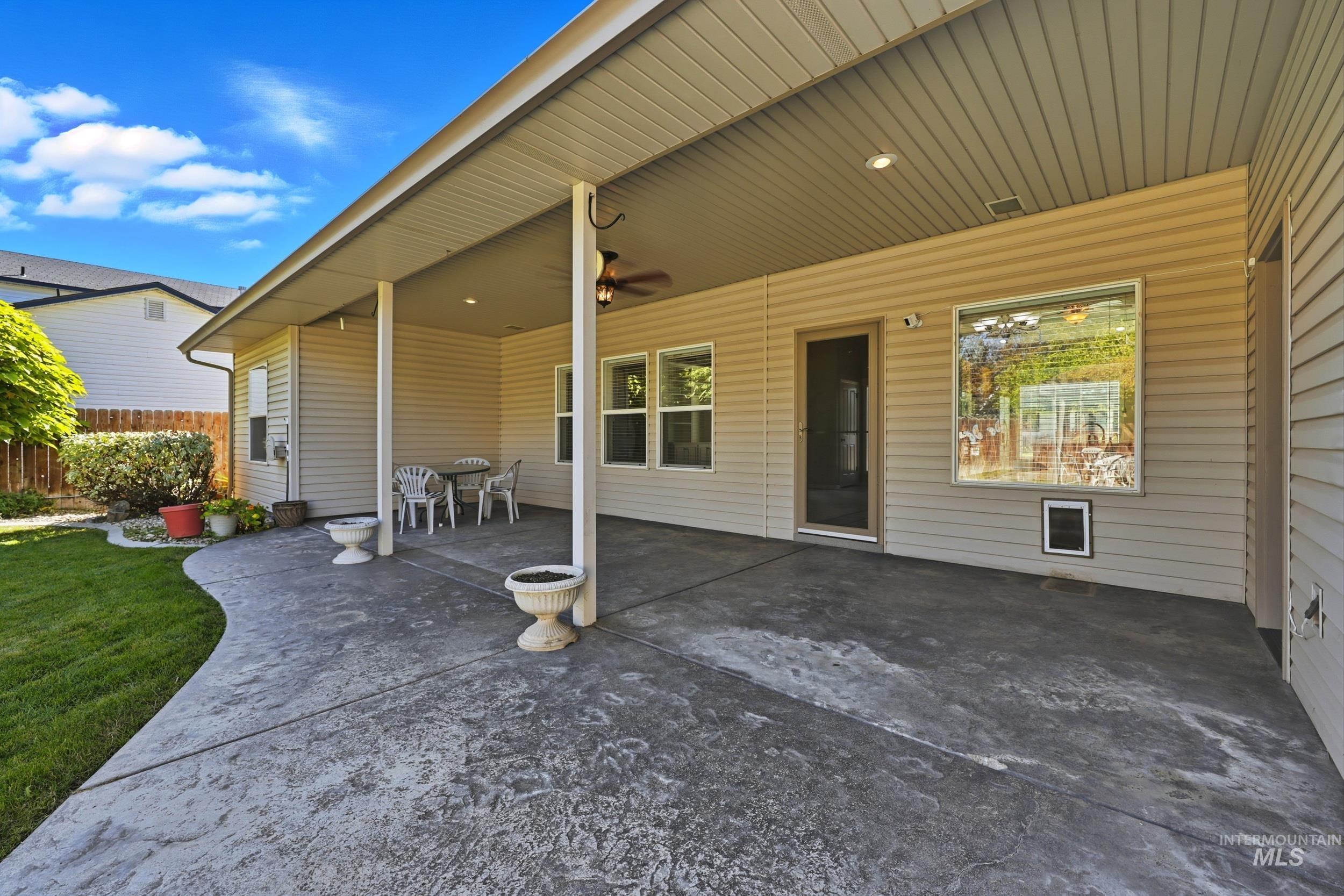 View of patio / terrace with a ceiling fan