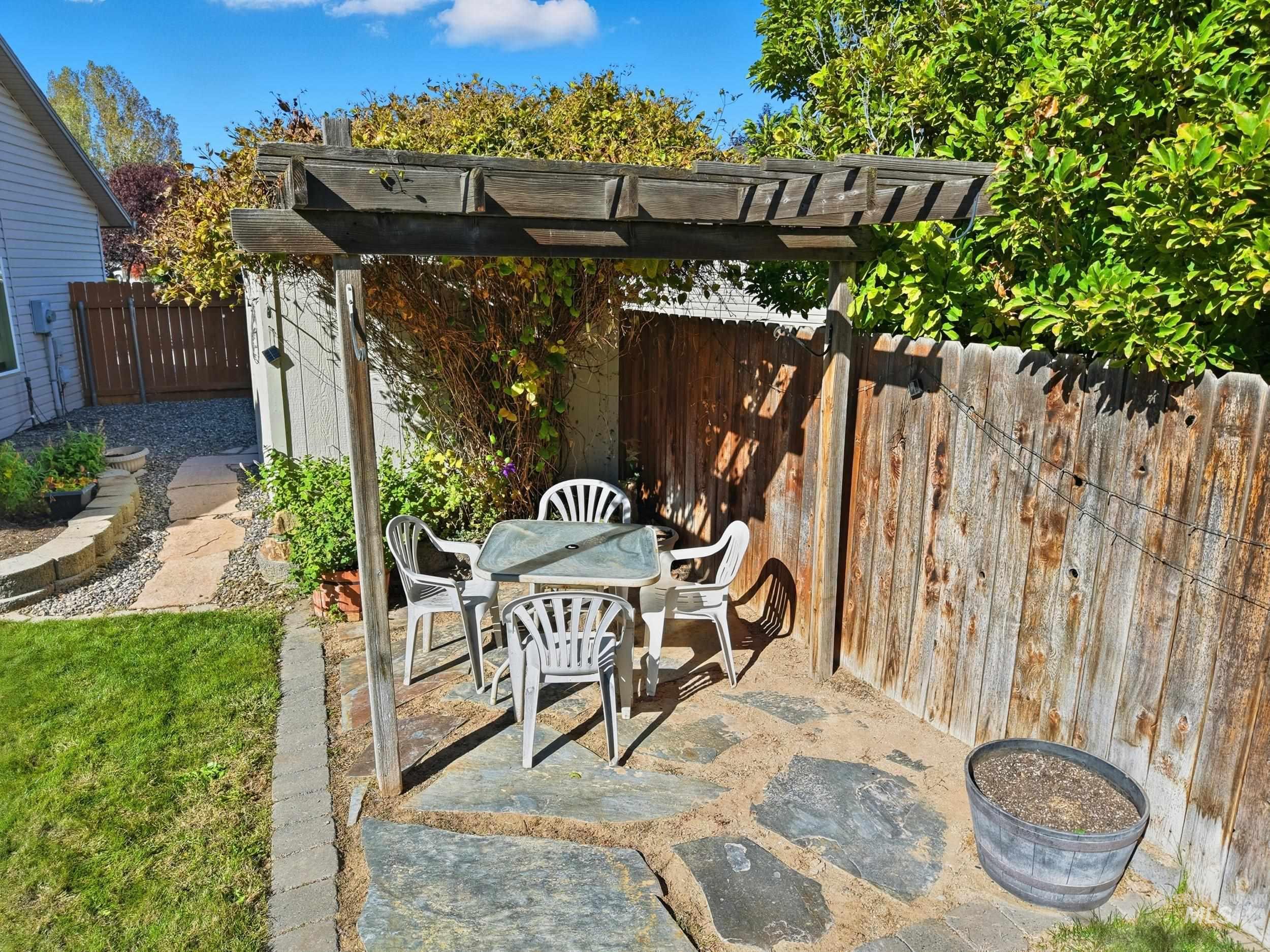 View of patio with outdoor dining area