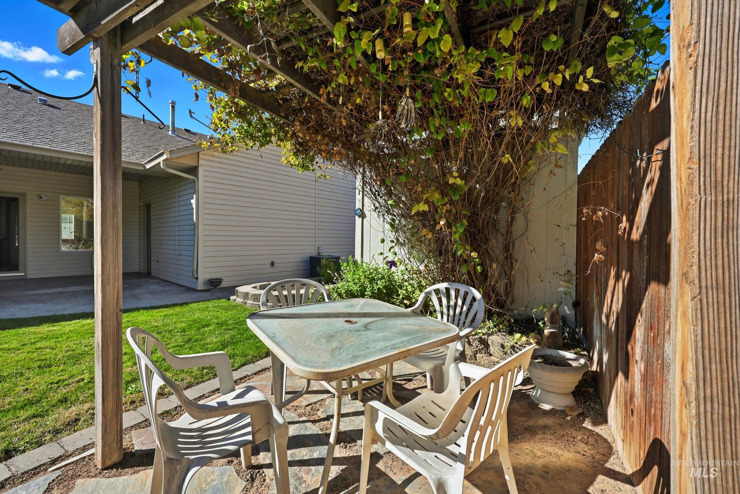 View of patio with outdoor dining area
