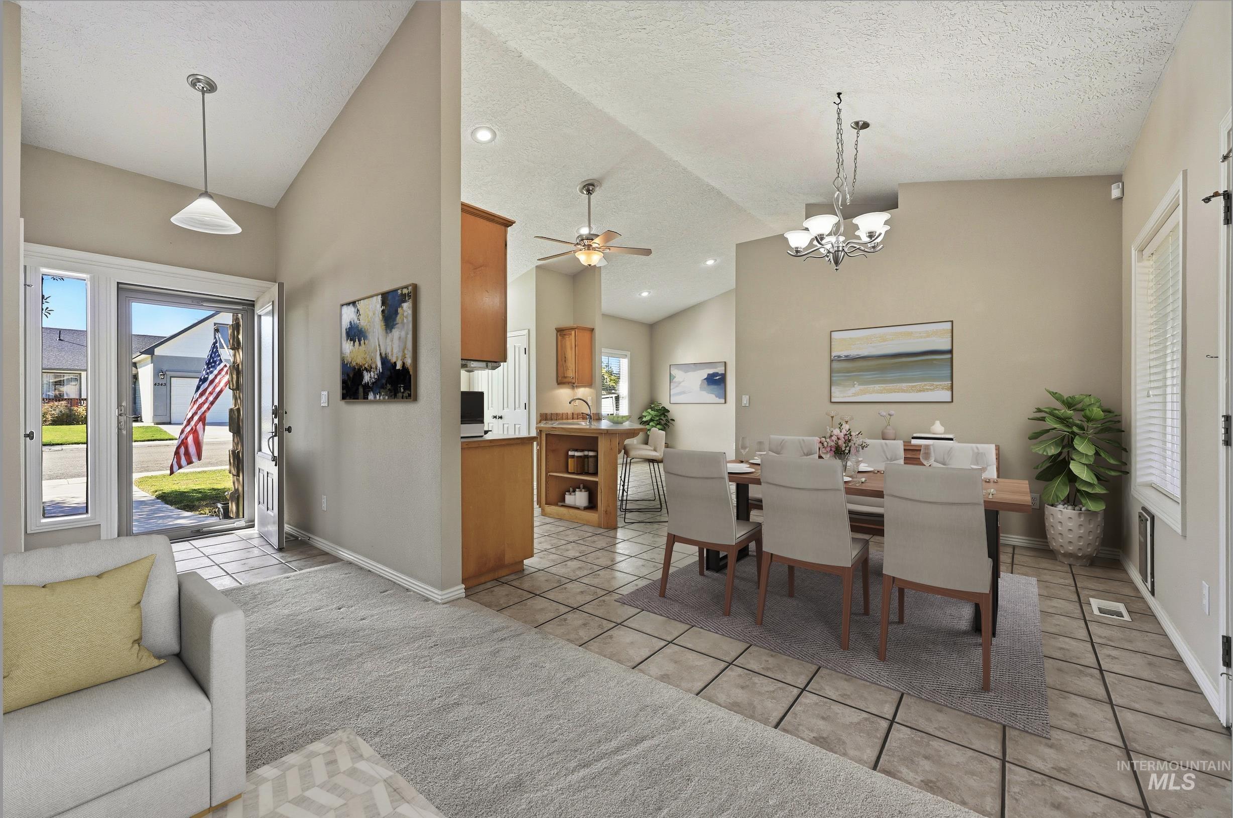 Dining room with light tile patterned floors, a chandelier, a ceiling fan, a textured ceiling, and recessed lighting
