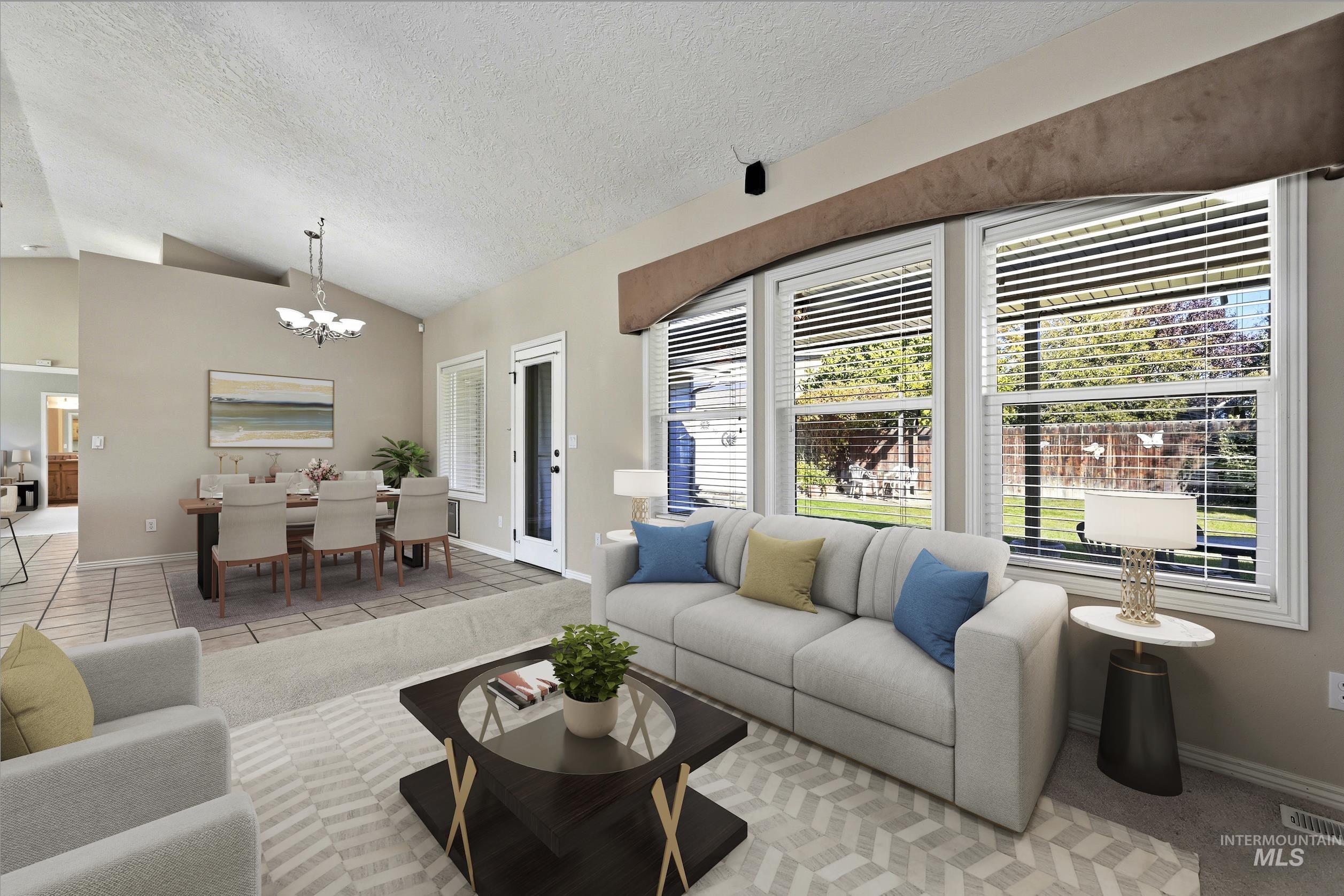 Tiled living room featuring vaulted ceiling, a chandelier, a textured ceiling, and carpet flooring