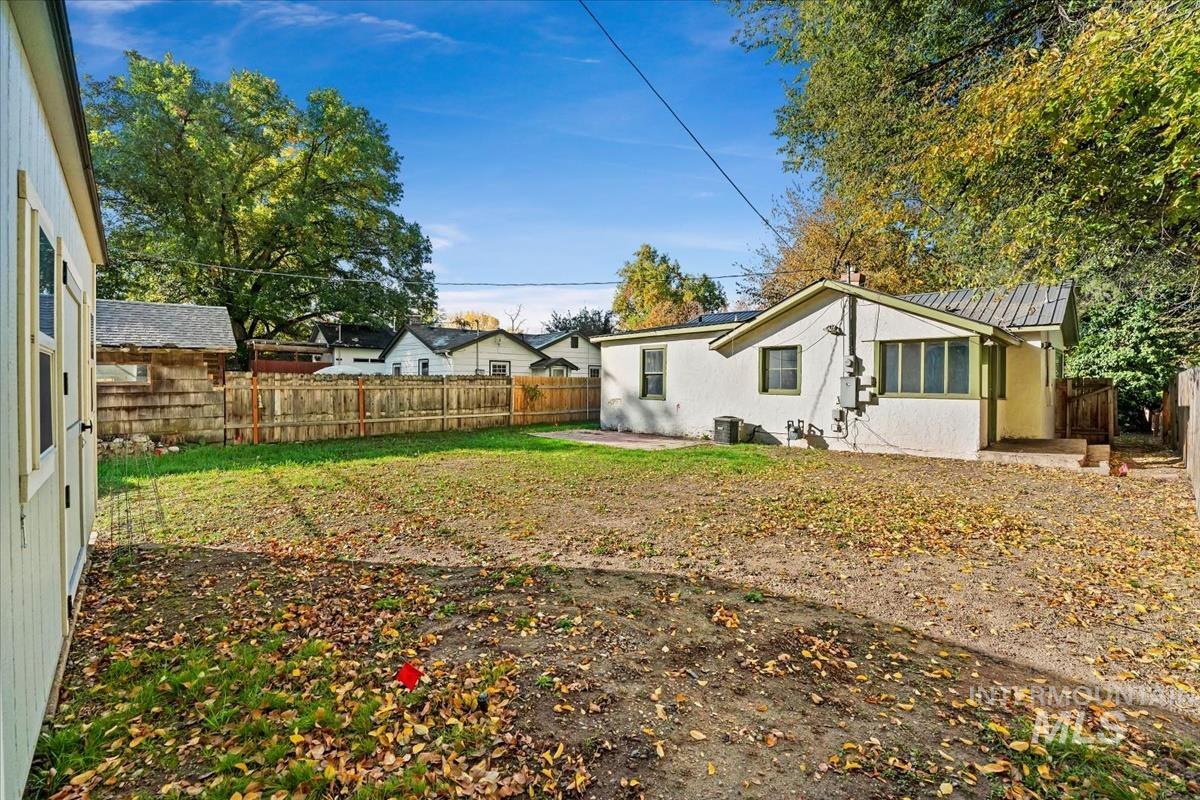 Fenced backyard featuring a patio area