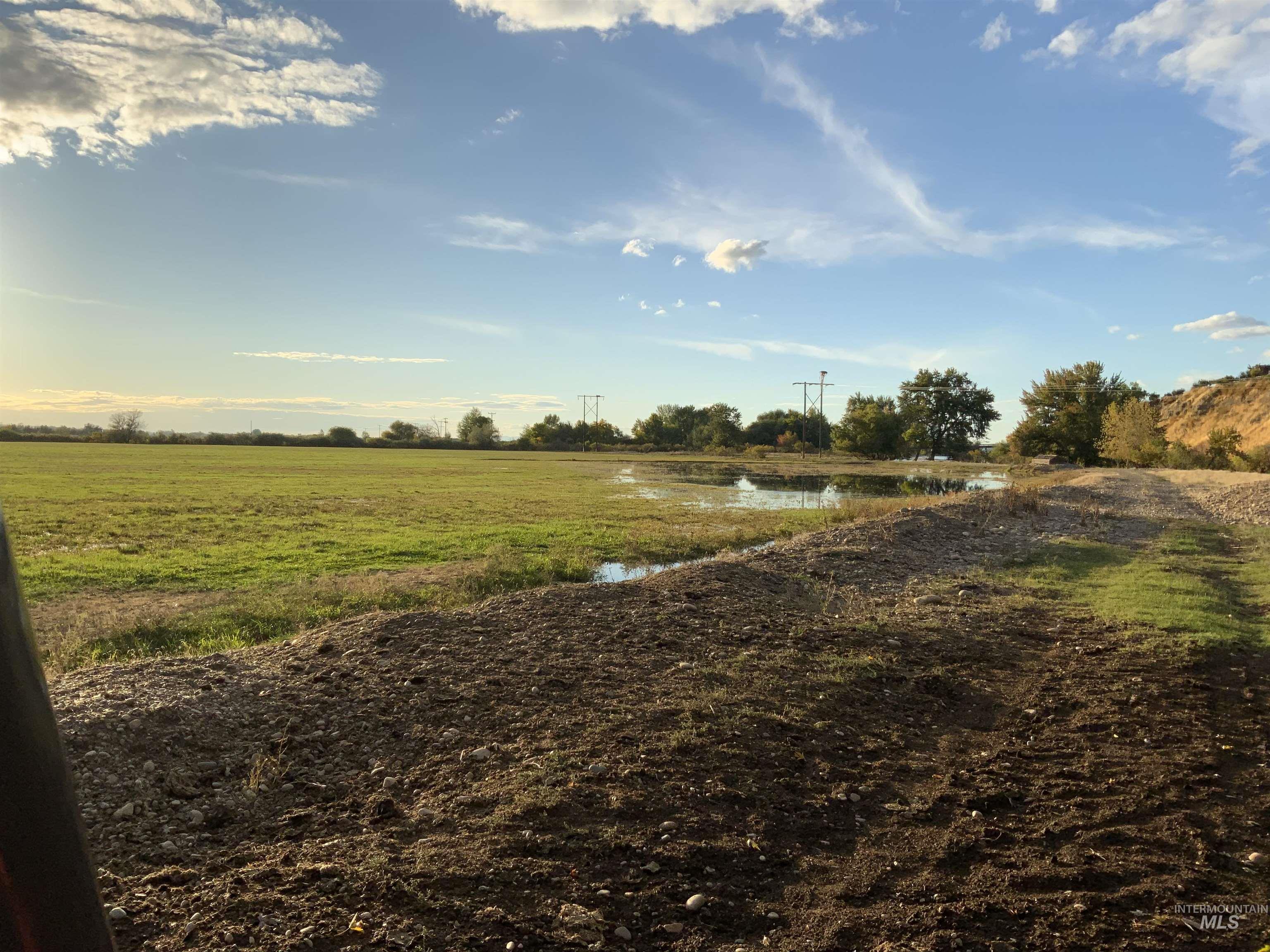 View of yard featuring a view of countryside and a water view