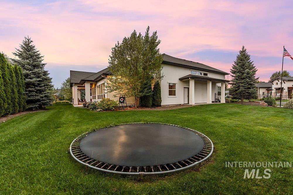 View of front of home featuring stucco siding