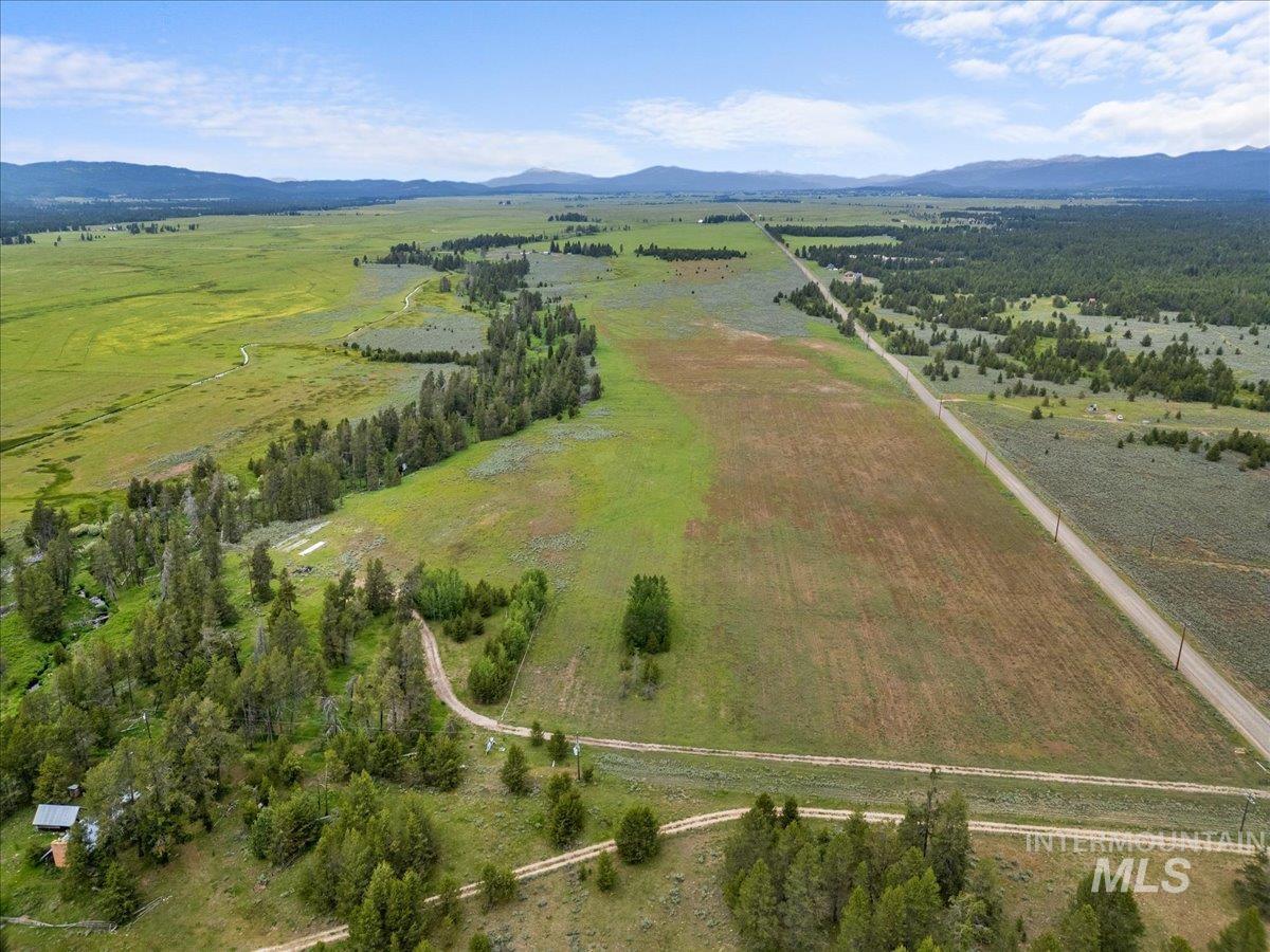 View of property location with rural landscape and mountains