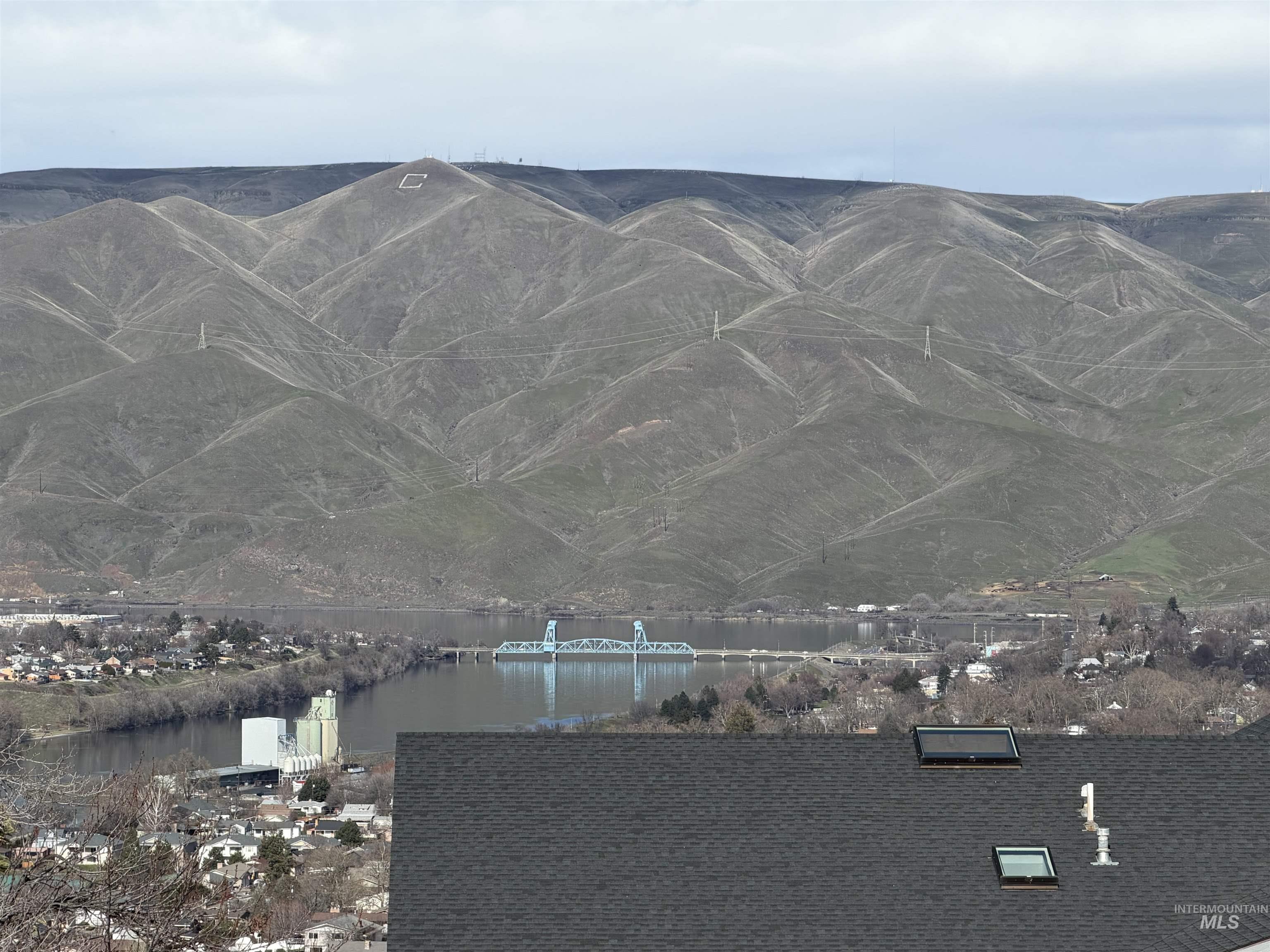 View of mountain background featuring a nearby body of water