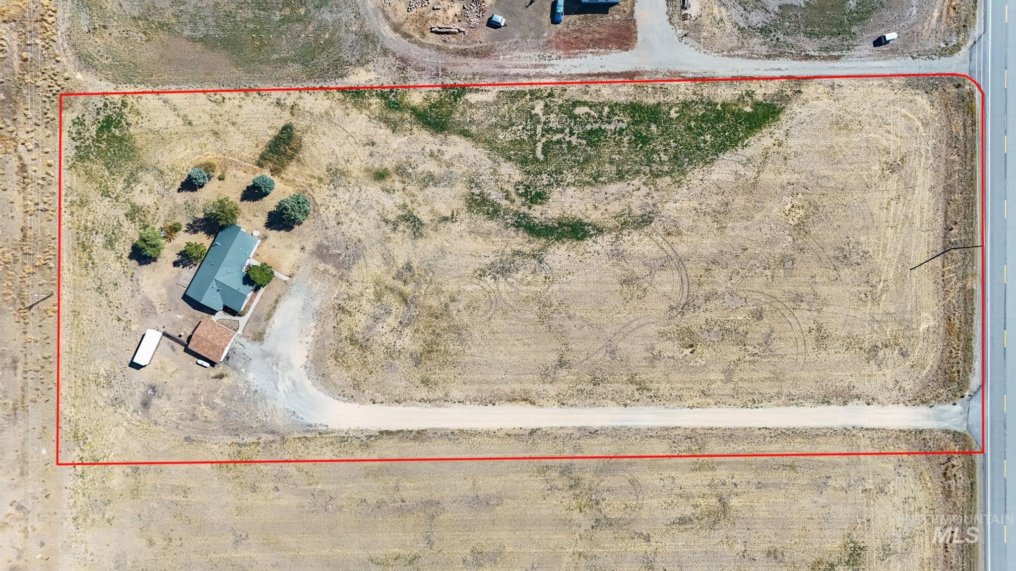 Aerial view of property's location featuring property parcel outlined