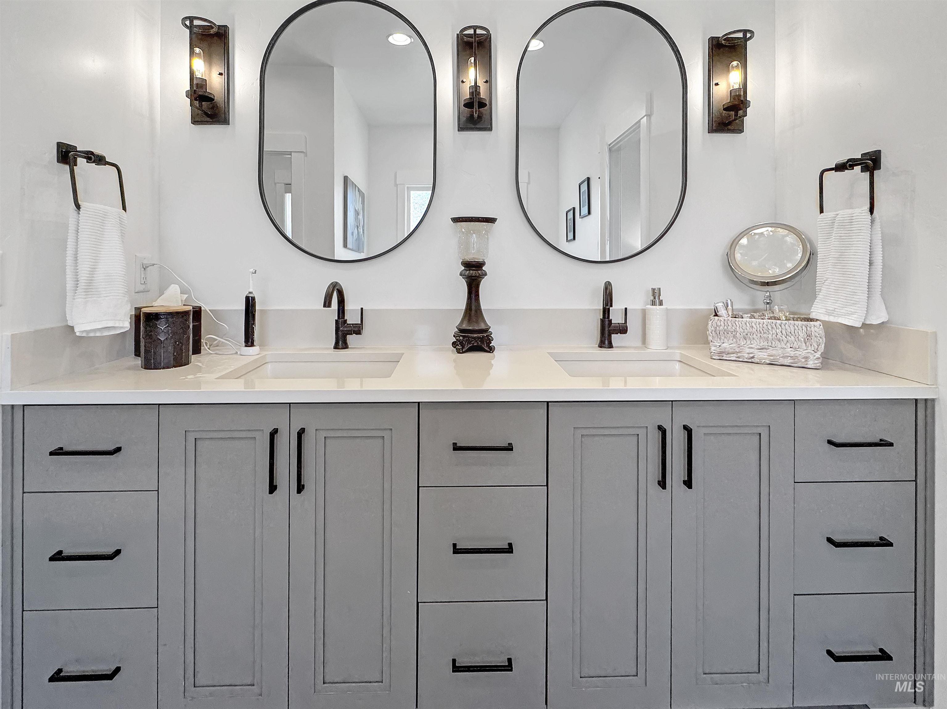 Bathroom featuring double vanity