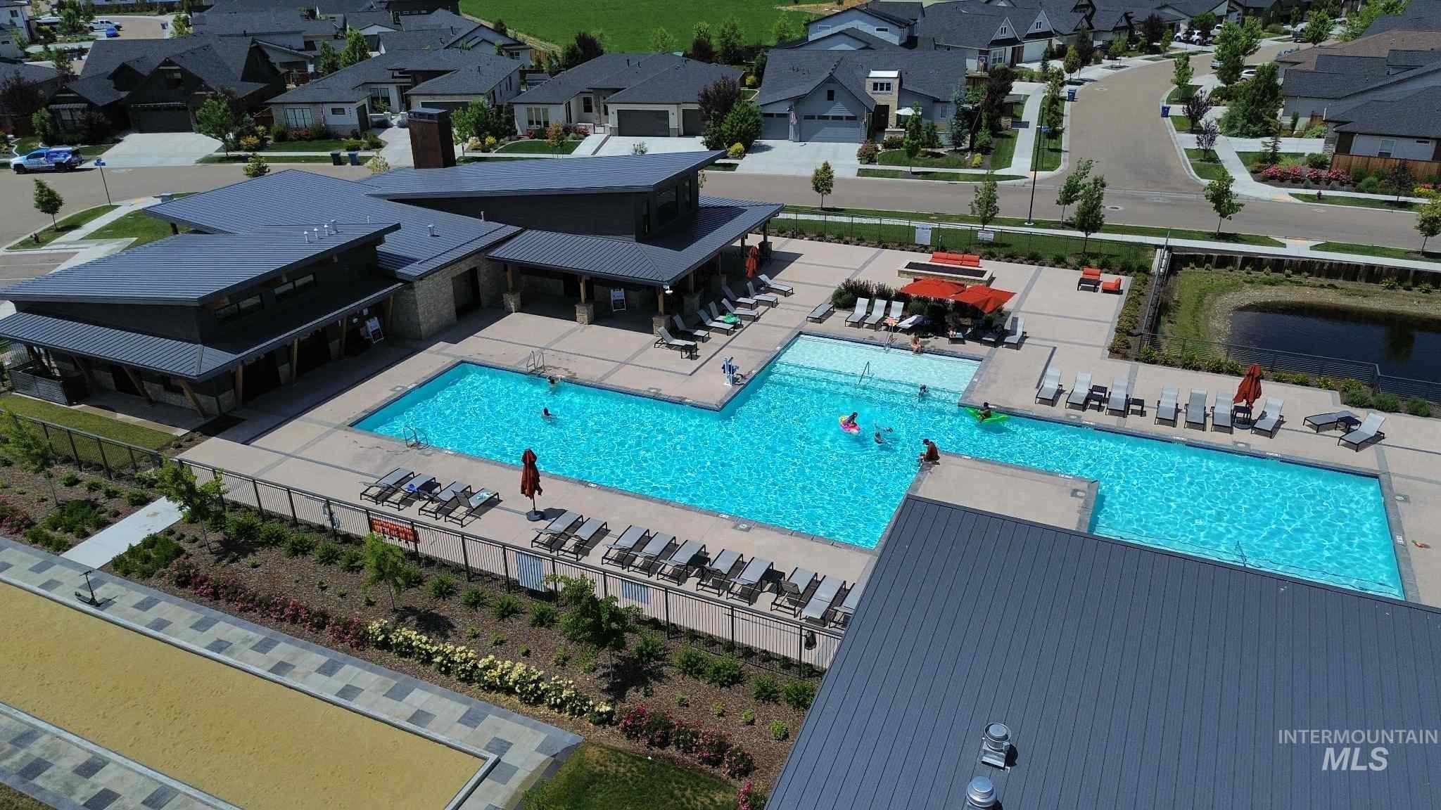 Community pool featuring a patio, gym, and clubhouse.