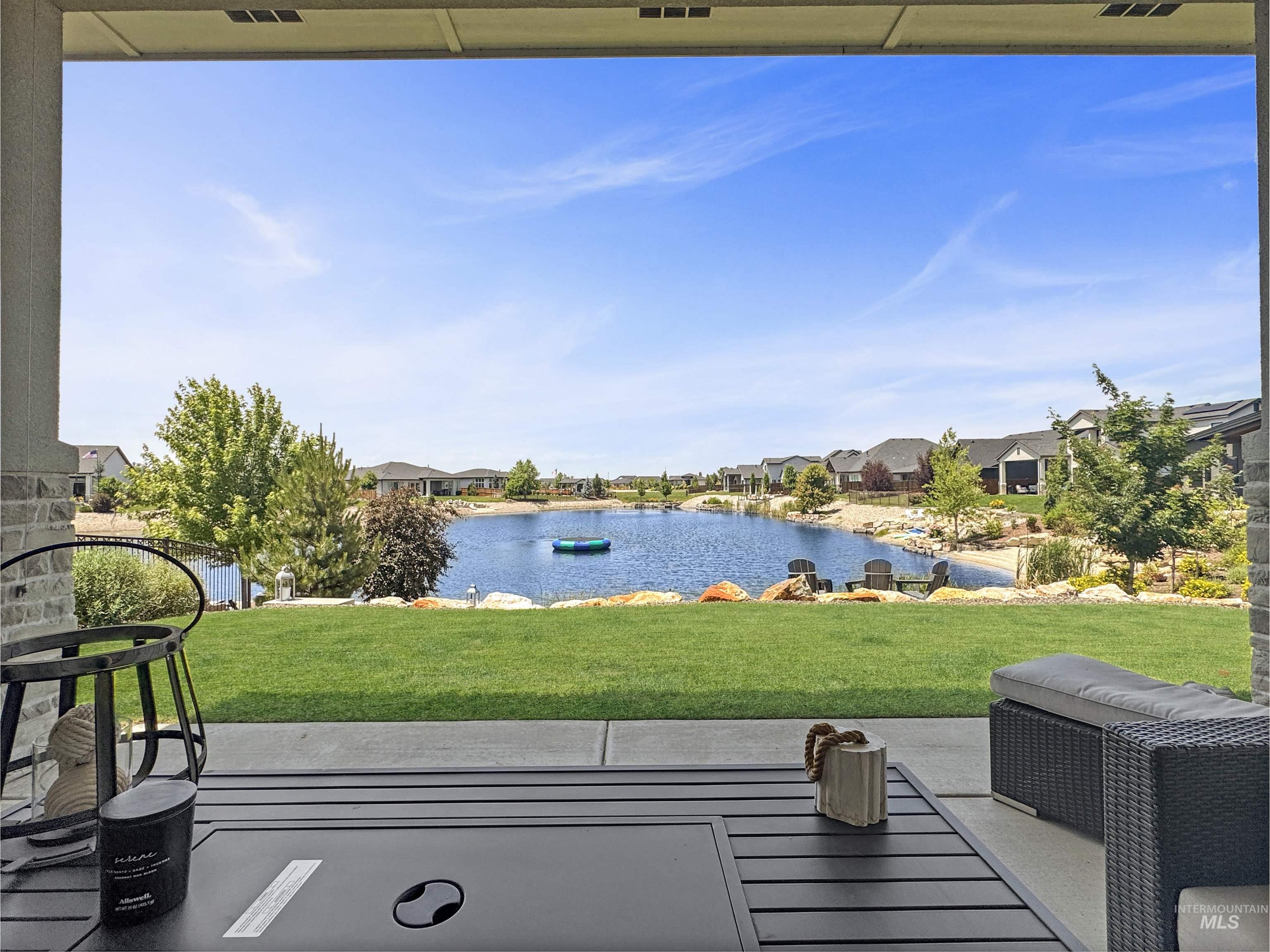 Water view featuring nearby suburban area