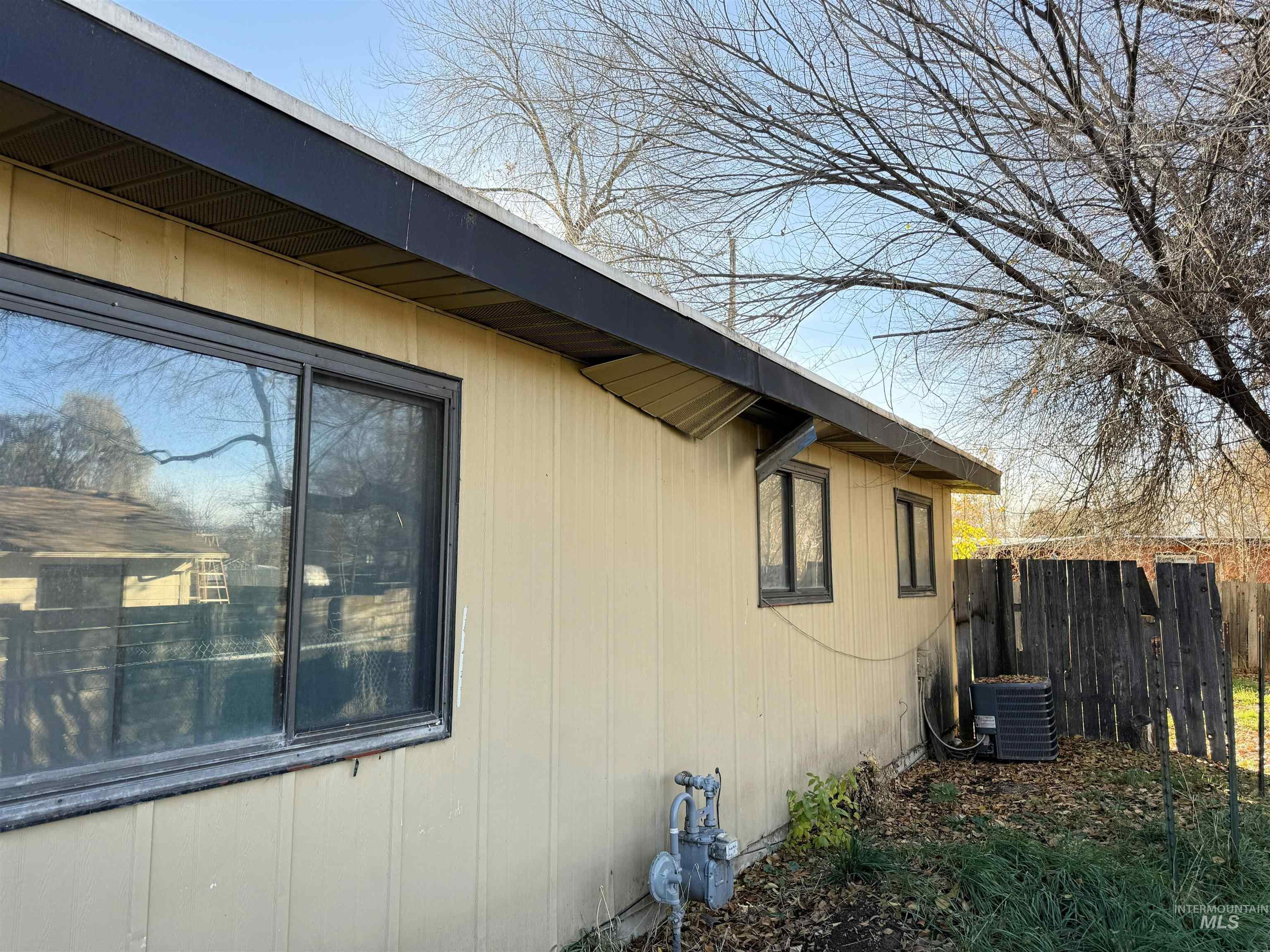 View of home's exterior featuring a central AC unit
