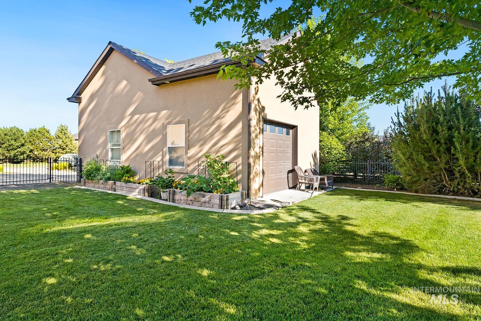 View of home's exterior featuring stucco siding