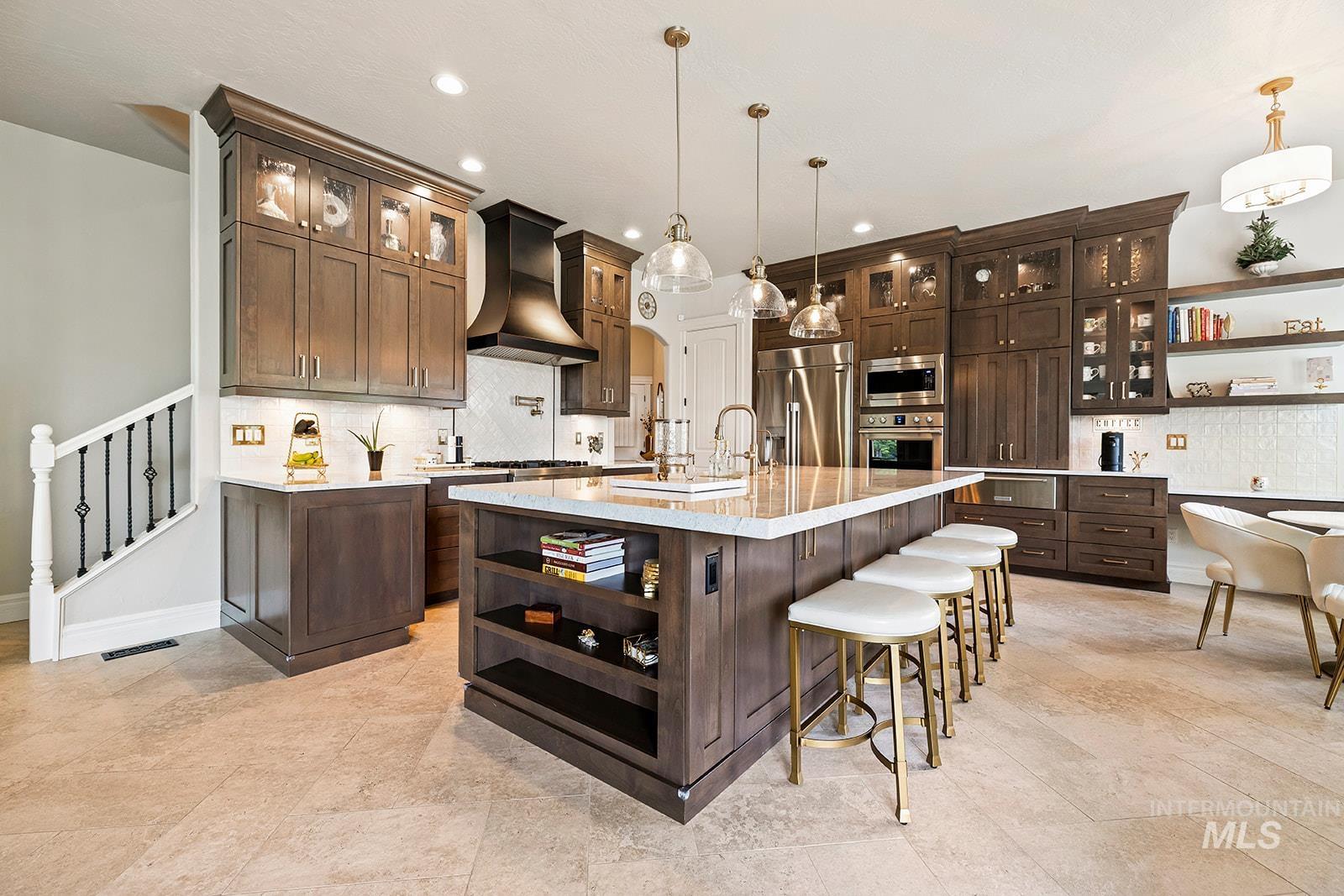 Kitchen featuring open shelves, decorative backsplash, glass insert cabinets, dark brown cabinetry, and recessed lighting
