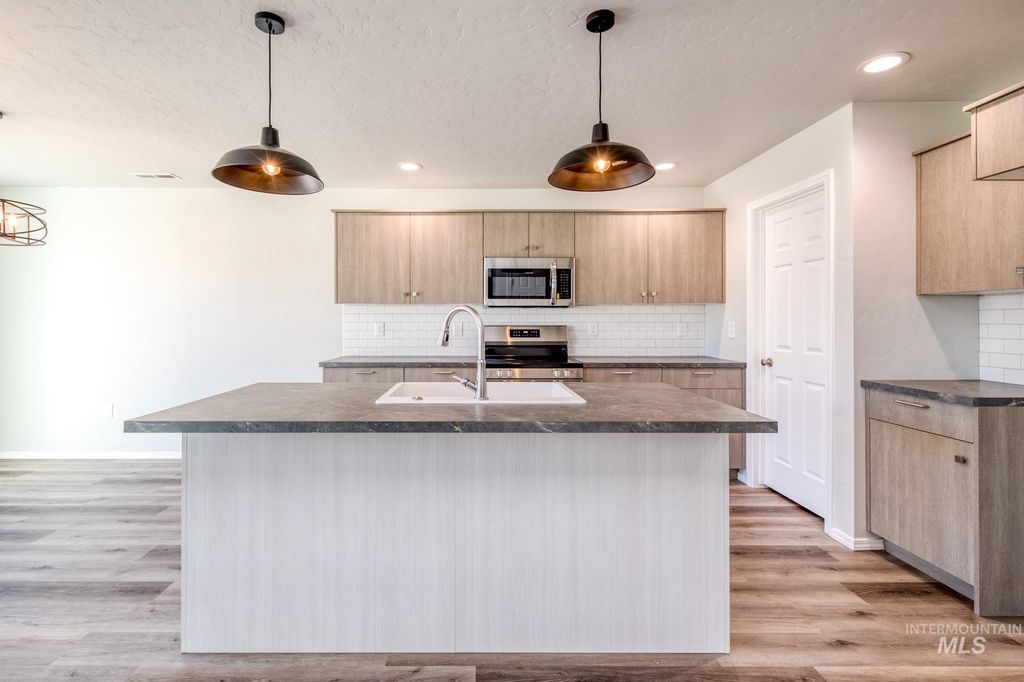 Photo of 7477 S Menzingers Ave, Meridian, ID 83642 (MLS # 98968398)