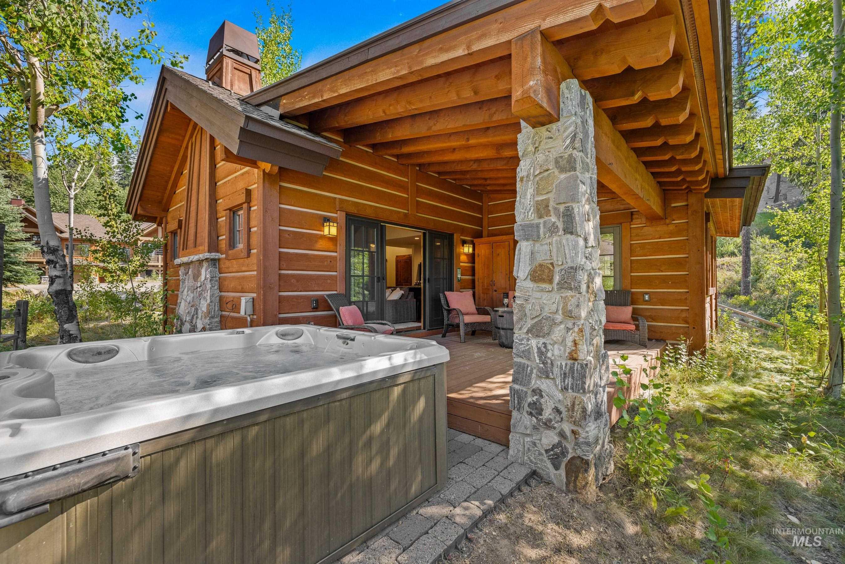 View of patio with hot tub
