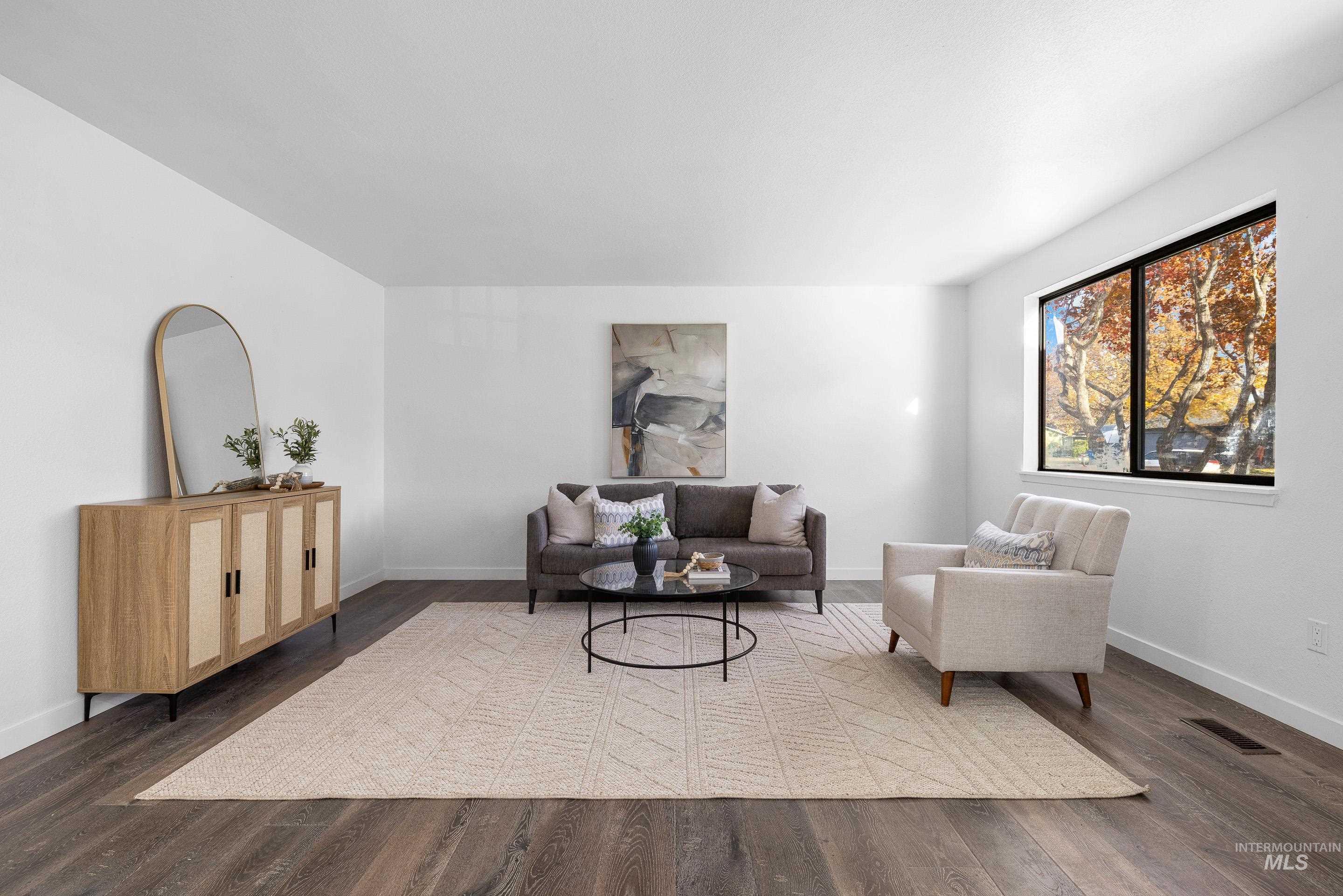 Sitting room with wood finished floors