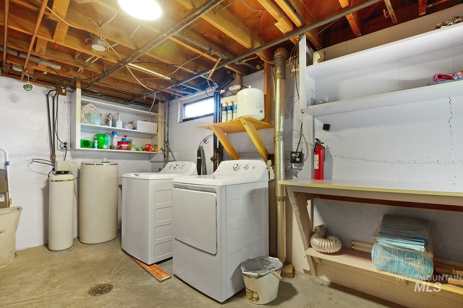Laundry room with washer and dryer