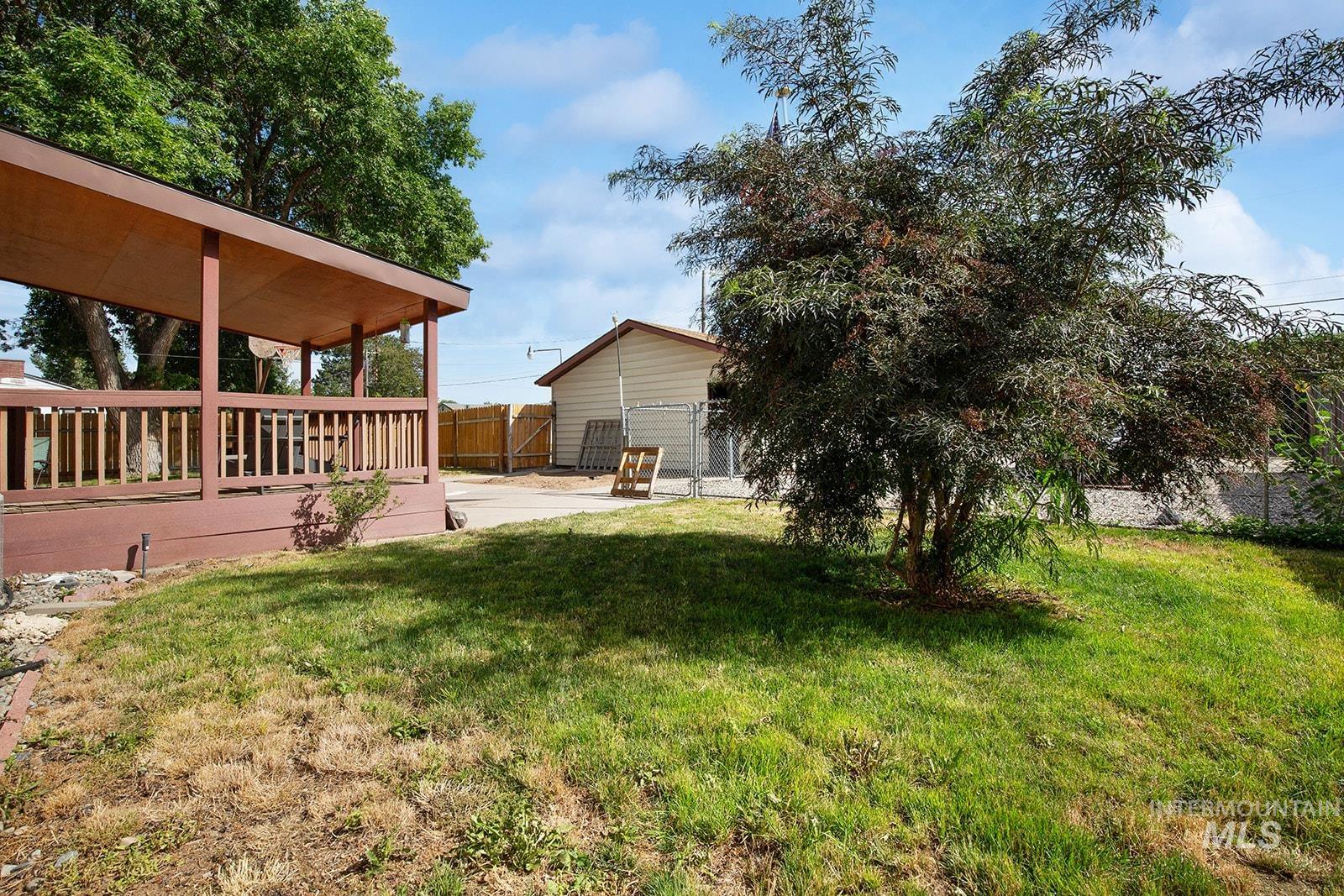 View of yard with a patio area
