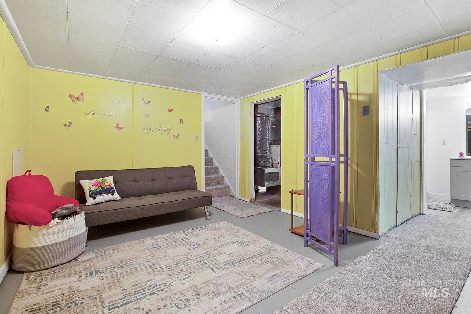 Living area featuring stairway