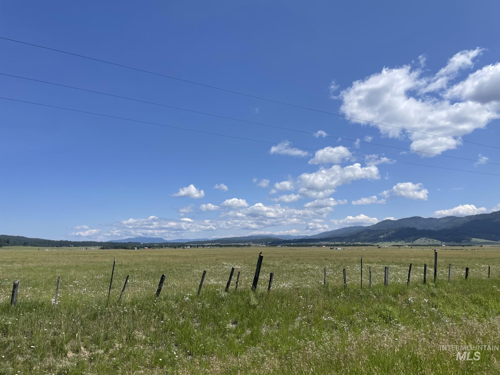 View of yard with a view of countryside and a mountain view