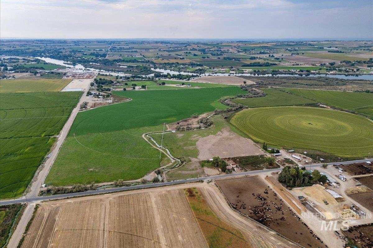 Aerial view of sparsely populated area featuring extensive farmland