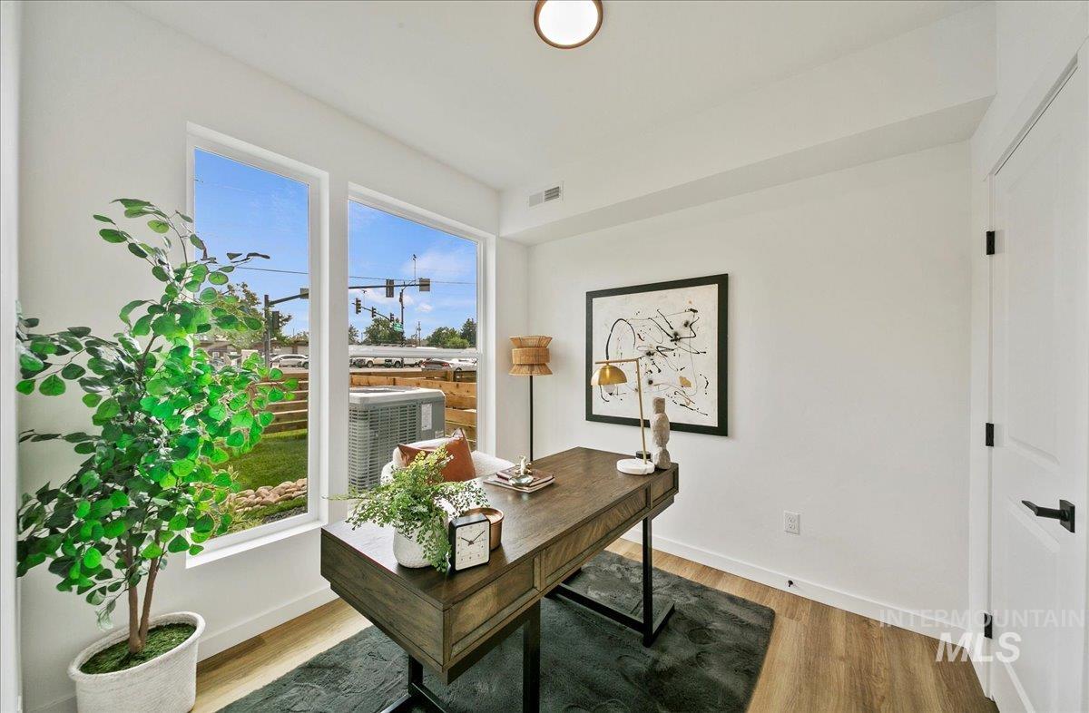 Office space featuring light wood finished floors
